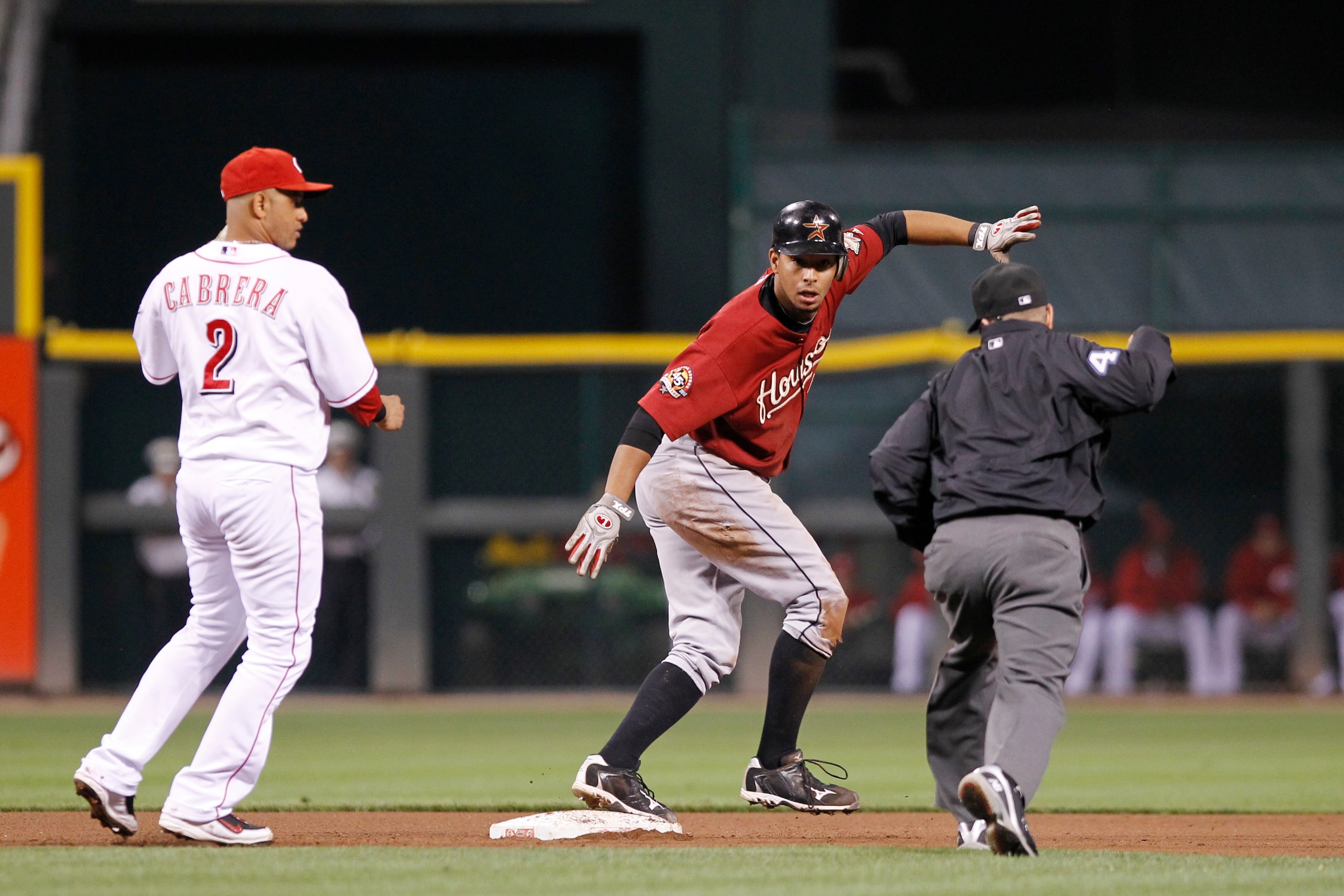 CINCINNATI, OH - SEPTEMBER 28: Angel Sanchez #36 of the Houston Astros looks at second base umpire Jerry Meals after being tagged out by Orlando Cabrera #2 of the Cincinnati Reds at Great American Ball Park on September 28, 2010 in Cincinnati, Ohio. The R