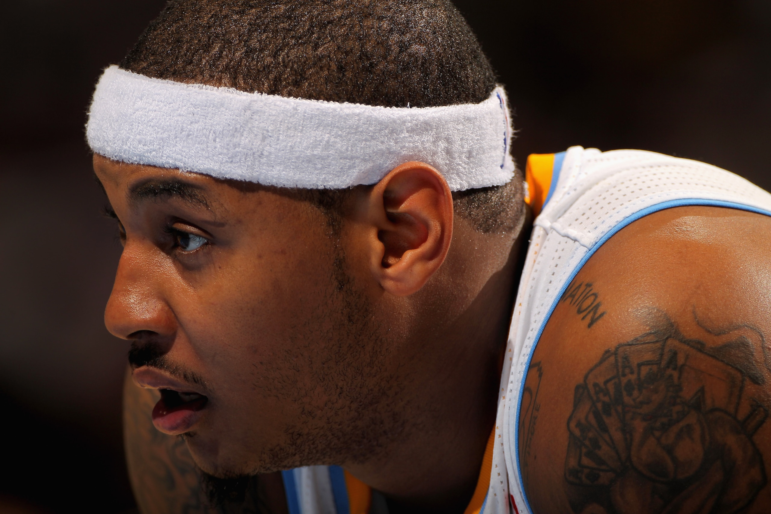 DENVER - NOVEMBER 16: Carmelo Anthony #15 of the Denver Nuggets looks on during a break in the action against the New York Knicks at the Pepsi Center on November 16, 2010 in Denver, Colorado. The Nuggets defeated the Knicks 120-118. NOTE TO USER: User ex DENVER - NOVEMBER 16: Carmelo Anthony #15 of the Denver Nuggets looks on during a break in the action against the New York Knicks at the Pepsi Center on November 16, 2010 in Denver, Colorado. The Nuggets defeated the Knicks 120-118. NOTE TO USER: User ex