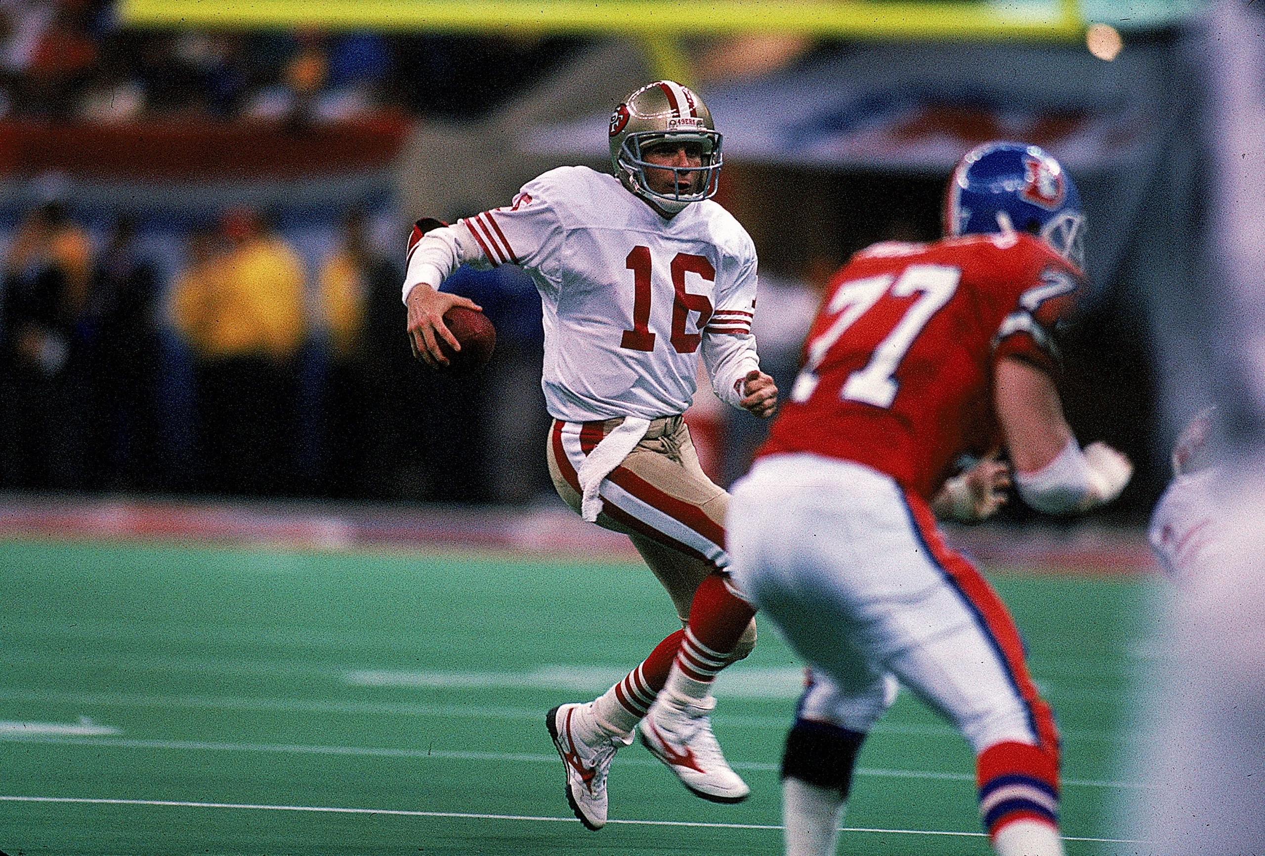 28 Jan 1990:  Quarterback Joe Montana #16 of the San Francisco 49ers in action during the NFL Super Bowl XXIV Game against Denver Broncos at the Louisiana Superdome in New Orleans, Louisiana. The 49ers defeated the Broncos 55-10. Mandatory Credit: Rick St