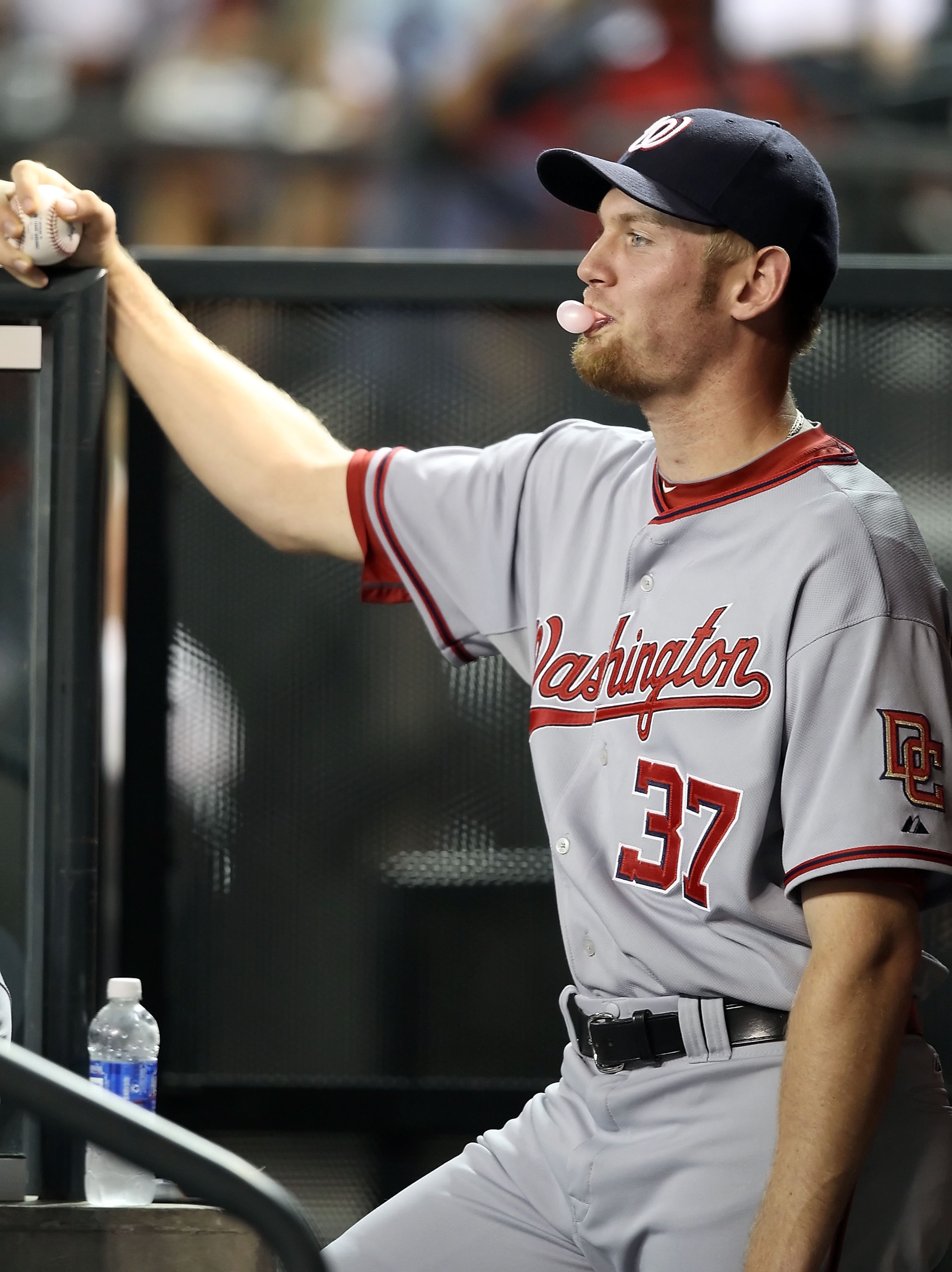 PHOENIX - AUGUST 04:  Pitcher Stephen Strasburg #37 of the Washington Nationals sits in the dugout during the Major League Baseball game against the Arizona Diamondbacks at Chase Field on August 4, 2010 in Phoenix, Arizona.  The Nationals defeated the Dia