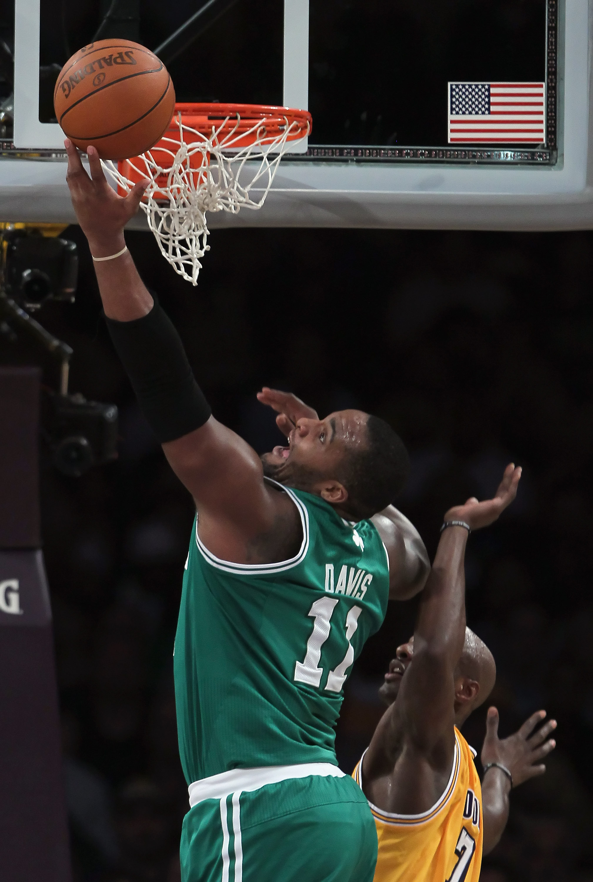 Rondo out, West breaks wrist, but Shaq leads Celtics to win over Nets