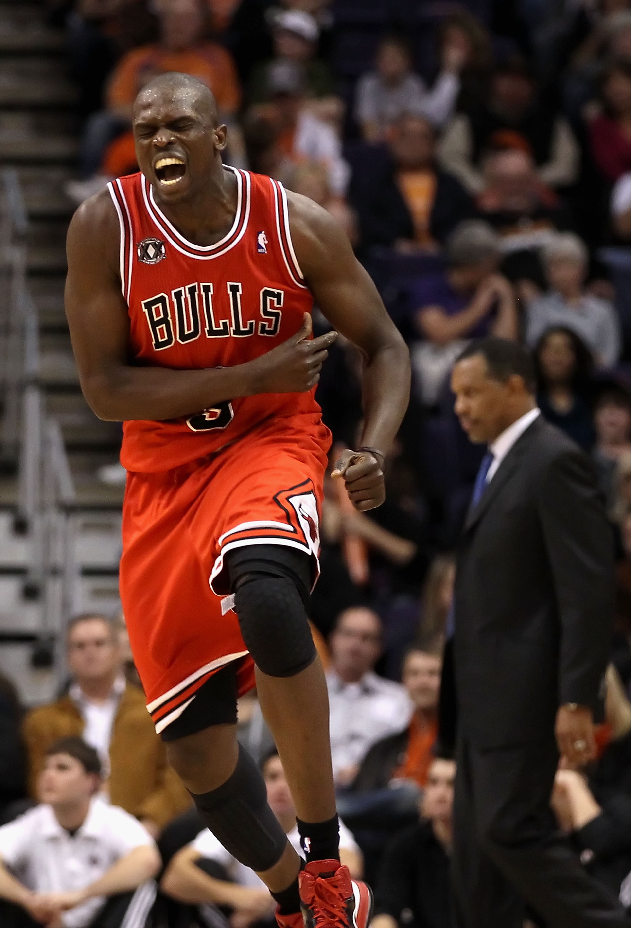 PHOENIX - NOVEMBER 24:  Luol Deng #9 of the Chicago Bulls celebrates after scoring against the Phoenix Suns late in overtime of the NBA game at US Airways Center on November 24, 2010 in Phoenix, Arizona. NOTE TO USER: User expressly acknowledges and agree