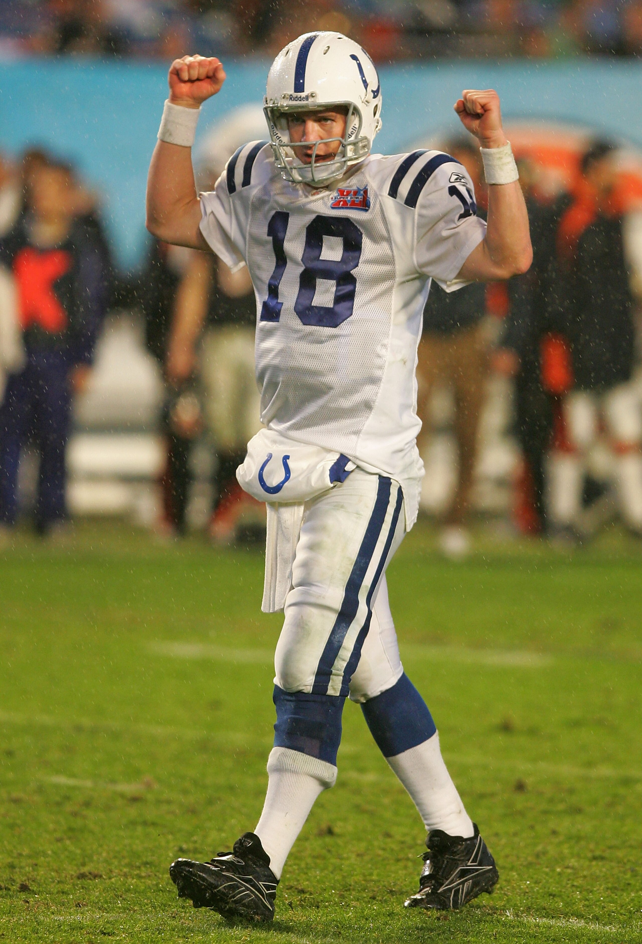 MIAMI GARDENS, FL - FEBRUARY 04:  Quarterback Peyton Manning #18 of the Indianapolis Colts celebrates a first down in the fourth quarter of Super Bowl XLI against the Chicago Bears on February 4, 2007 at Dolphin Stadium in Miami Gardens, Florida.  (Photo