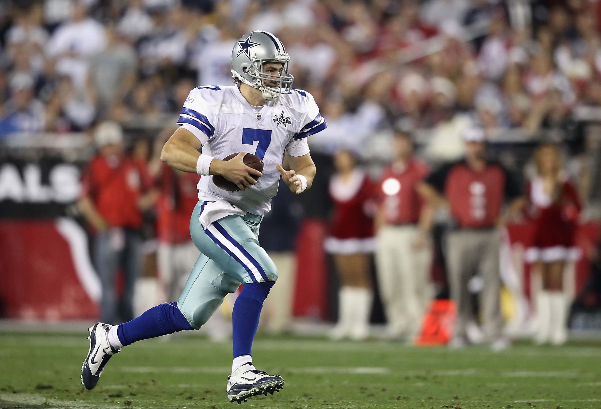 GLENDALE, AZ - DECEMBER 25:  Quarterback Stephen McGee #7 of the Dallas Cowboys scrambles with the football during the NFL game against the Arizona Cardinals at the University of Phoenix Stadium on December 25, 2010 in Glendale, Arizona.  The Cardinals de
