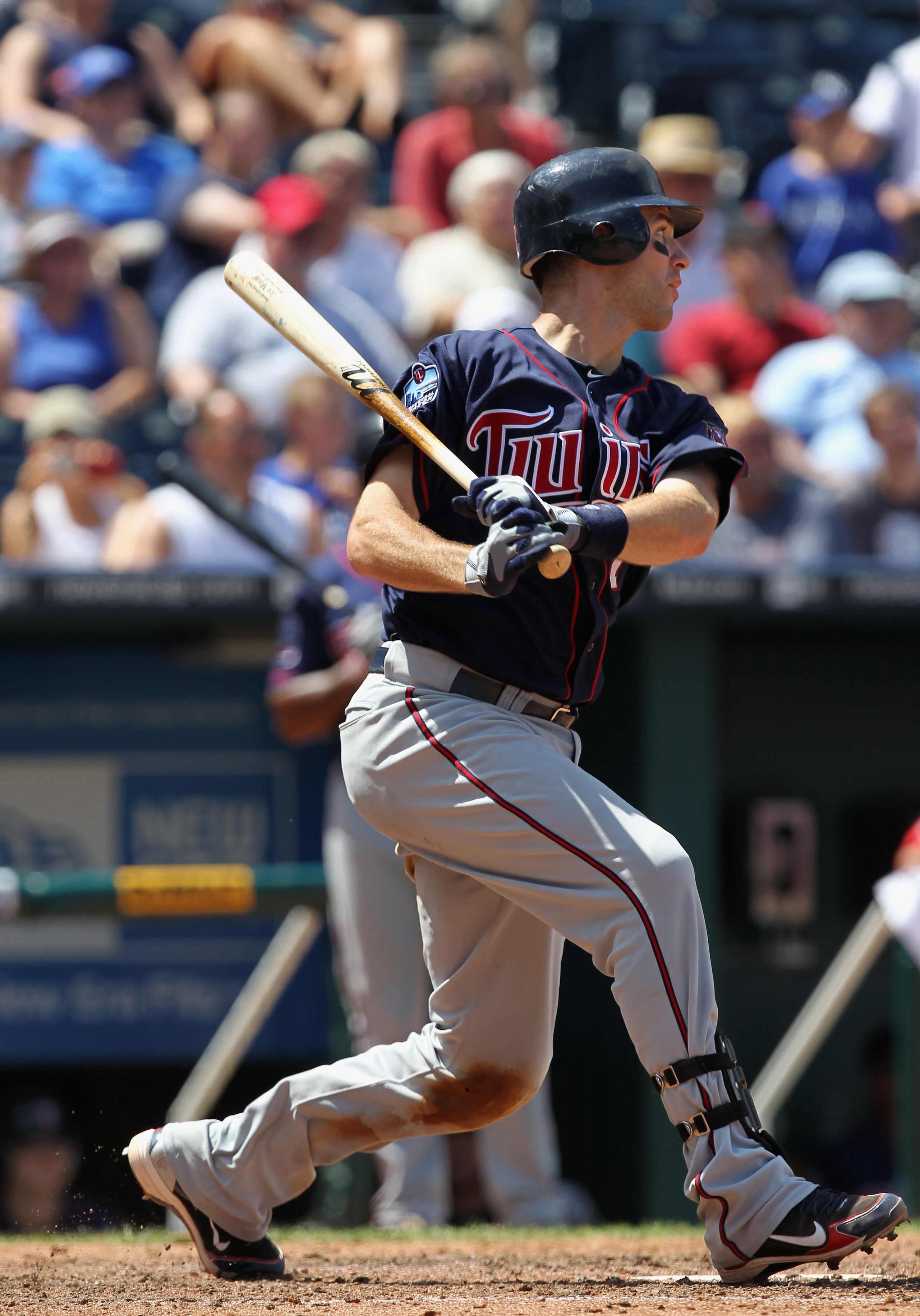 KANSAS CITY, MO - JULY 28:  Catcher Joe Mauer #7 of the Minnesota Twins bats during the game against the Kansas City Royals on July 28, 2010 at Kauffman Stadium in Kansas City, Missouri.  (Photo by Jamie Squire/Getty Images)