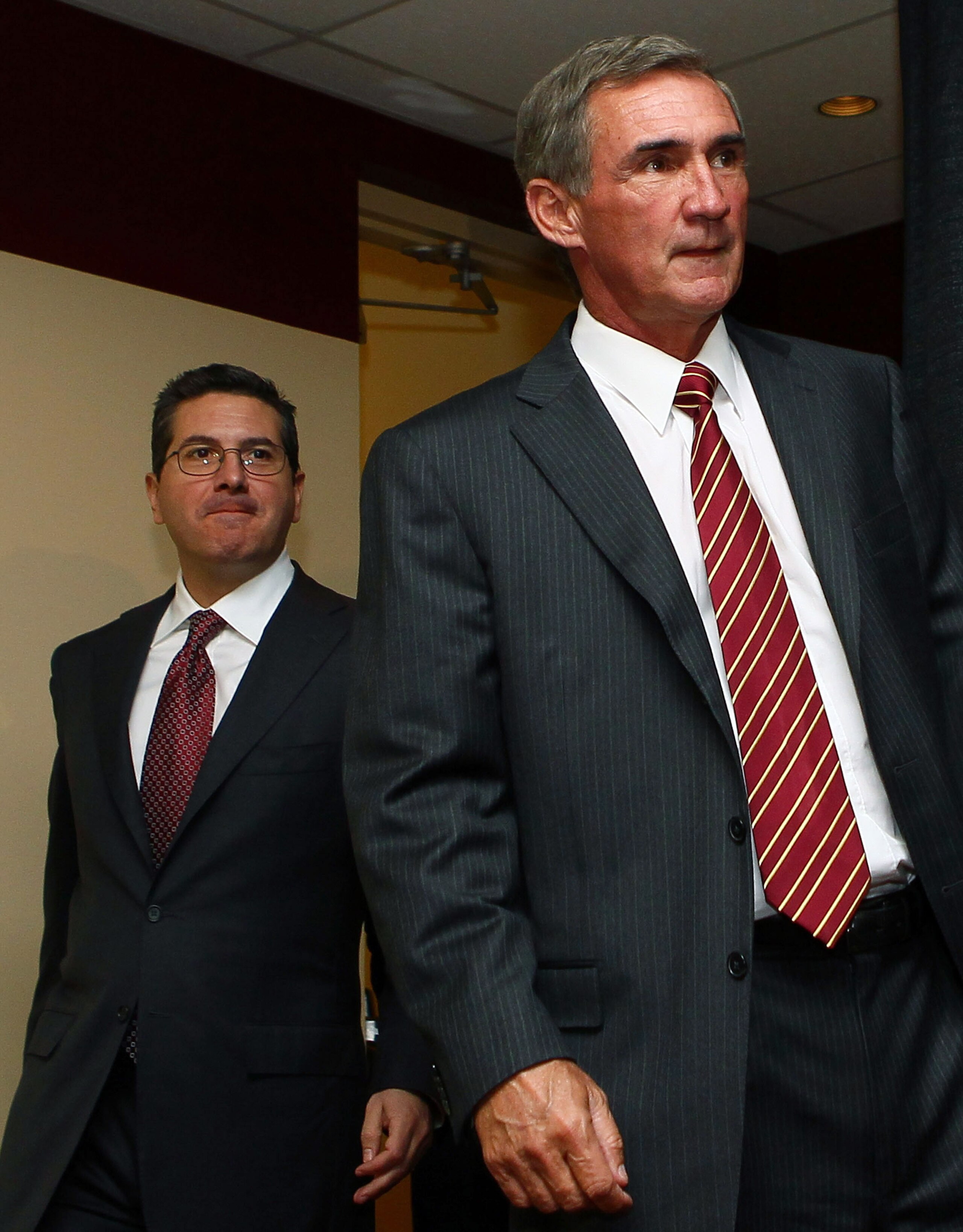 ASHBURN, VA - JANUARY 06:  Mike Shanahan (R) arrives for a press conference with Washington Redskins owner Daniel Snyder (L) before being announced as the new head coach of the Washington Redskins on January 6, 2010 in Ashburn, Virginia. Shanahan replaces