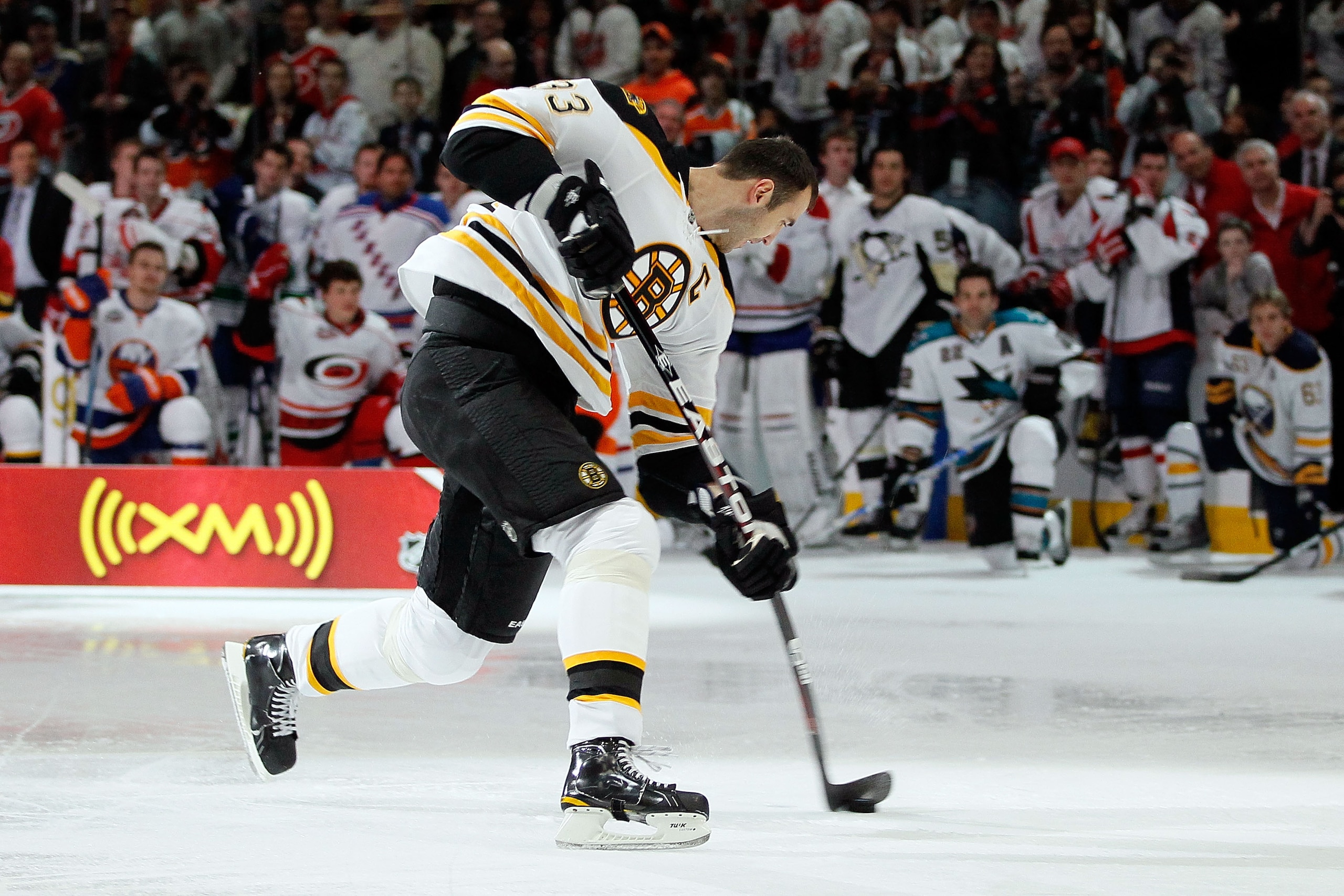 RALEIGH, NC - JANUARY 29: Zdeno Chara #33 of the Boston Bruins competes on his way to winning the hardest shot part of the Honda NHL SuperSkills competition part of 2011 NHL All-Star Weekend at the RBC Center on January 29, 2011 in Raleigh, North Carolin RALEIGH, NC - JANUARY 29: Zdeno Chara #33 of the Boston Bruins competes on his way to winning the hardest shot part of the Honda NHL SuperSkills competition part of 2011 NHL All-Star Weekend at the RBC Center on January 29, 2011 in Raleigh, North Carolin