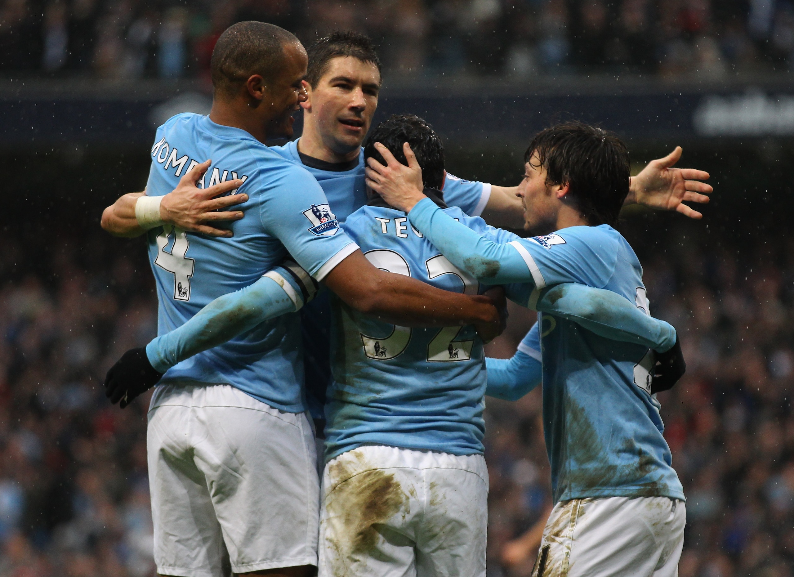MANCHESTER, ENGLAND - FEBRUARY 05:  Carlos Tevez of Manchester City celebrates with team mates after scoring his second goal during the Barclays Premier League match between Manchester City and West Bromwich Albion at the City of Manchester Stadium on Feb