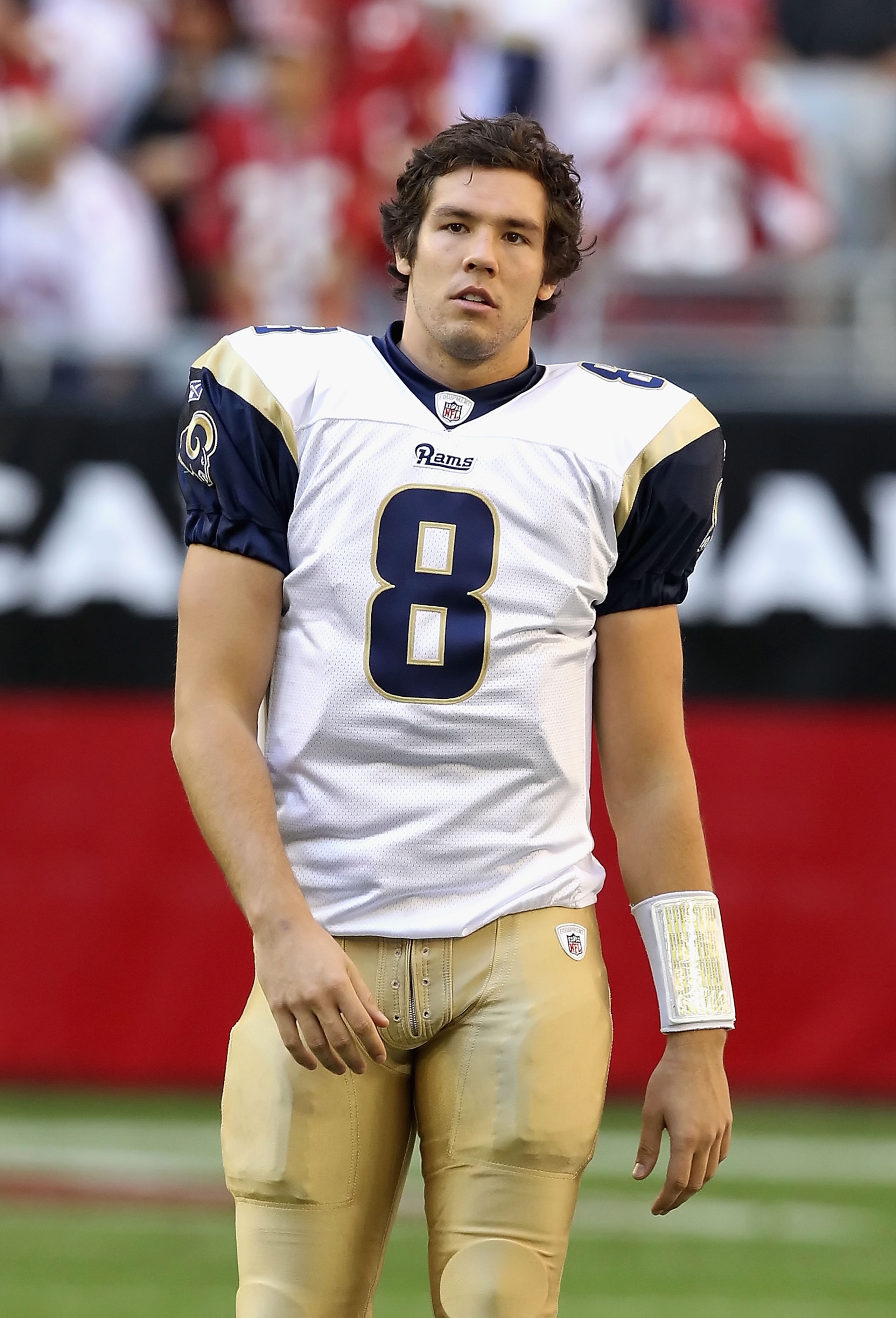 GLENDALE, AZ - DECEMBER 05:  Quarterback Sam Bradford #8 of the St. Louis Rams warms up before the NFL game against the Arizona Cardinals at the University of Phoenix Stadium on December 5, 2010 in Glendale, Arizona. The Rams defeated the Cardinals 19-6.