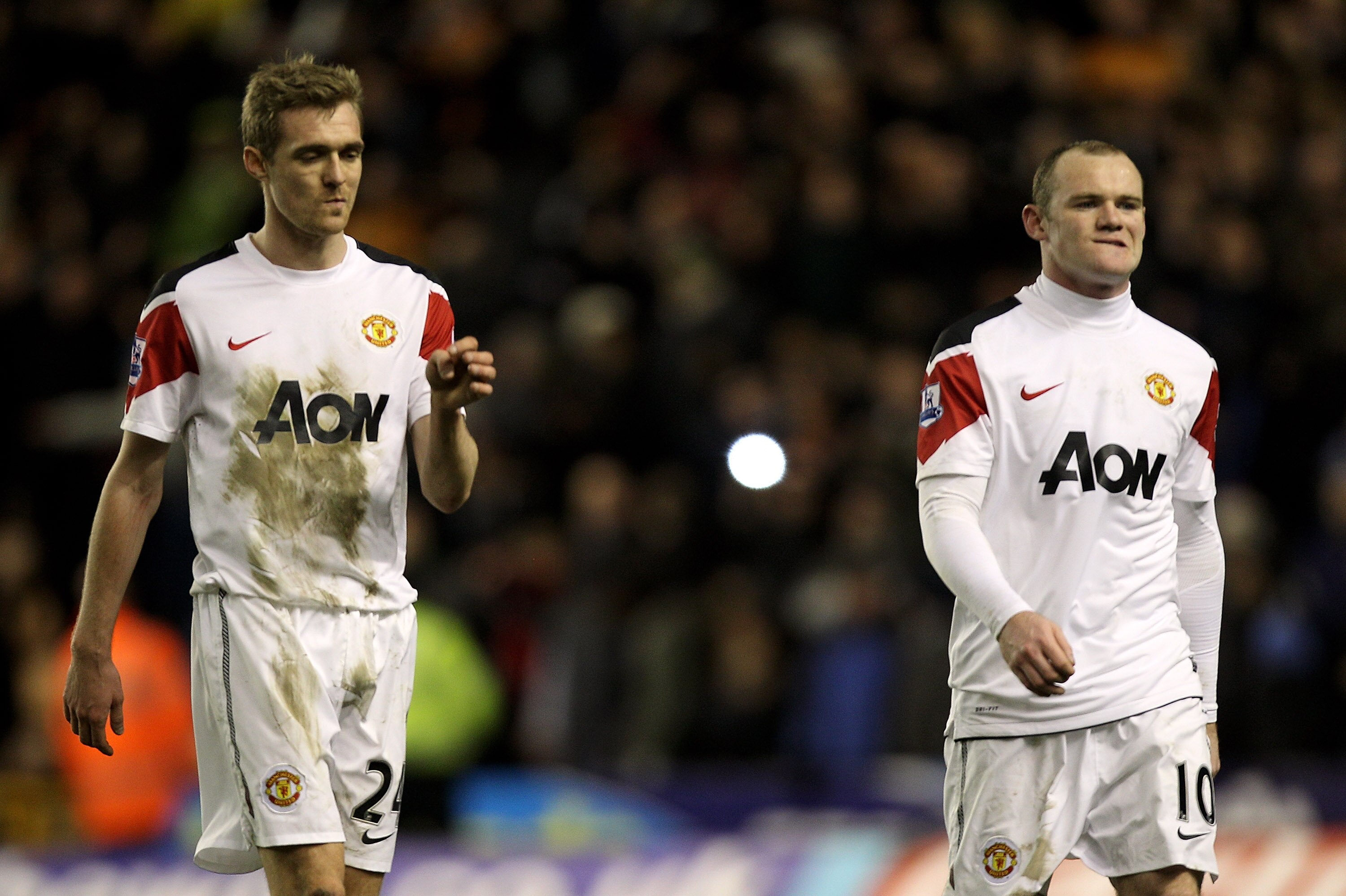 WOLVERHAMPTON, ENGLAND - FEBRUARY 05:  Daarren Fletcher (L) and Wayne Rooney of Manchester United leave the pitch dejected after the Barclays Premier League match between Wolverhampton Wanderers and Manchester United at Molineux on February 5, 2011 in Wol