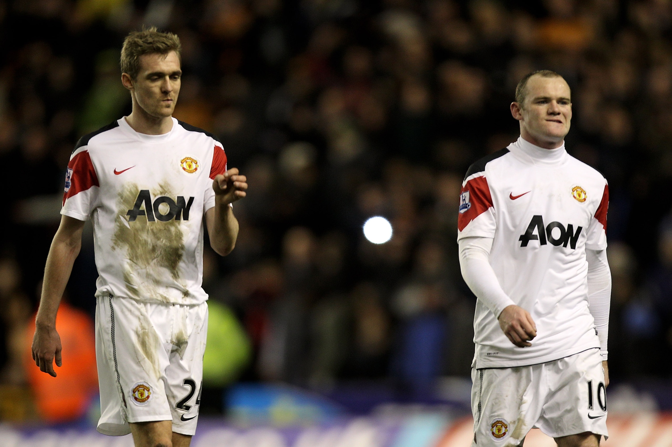 WOLVERHAMPTON, ENGLAND - FEBRUARY 05:  Daarren Fletcher (L) and Wayne Rooney of Manchester United leave the pitch dejected after the Barclays Premier League match between Wolverhampton Wanderers and Manchester United at Molineux on February 5, 2011 in Wol