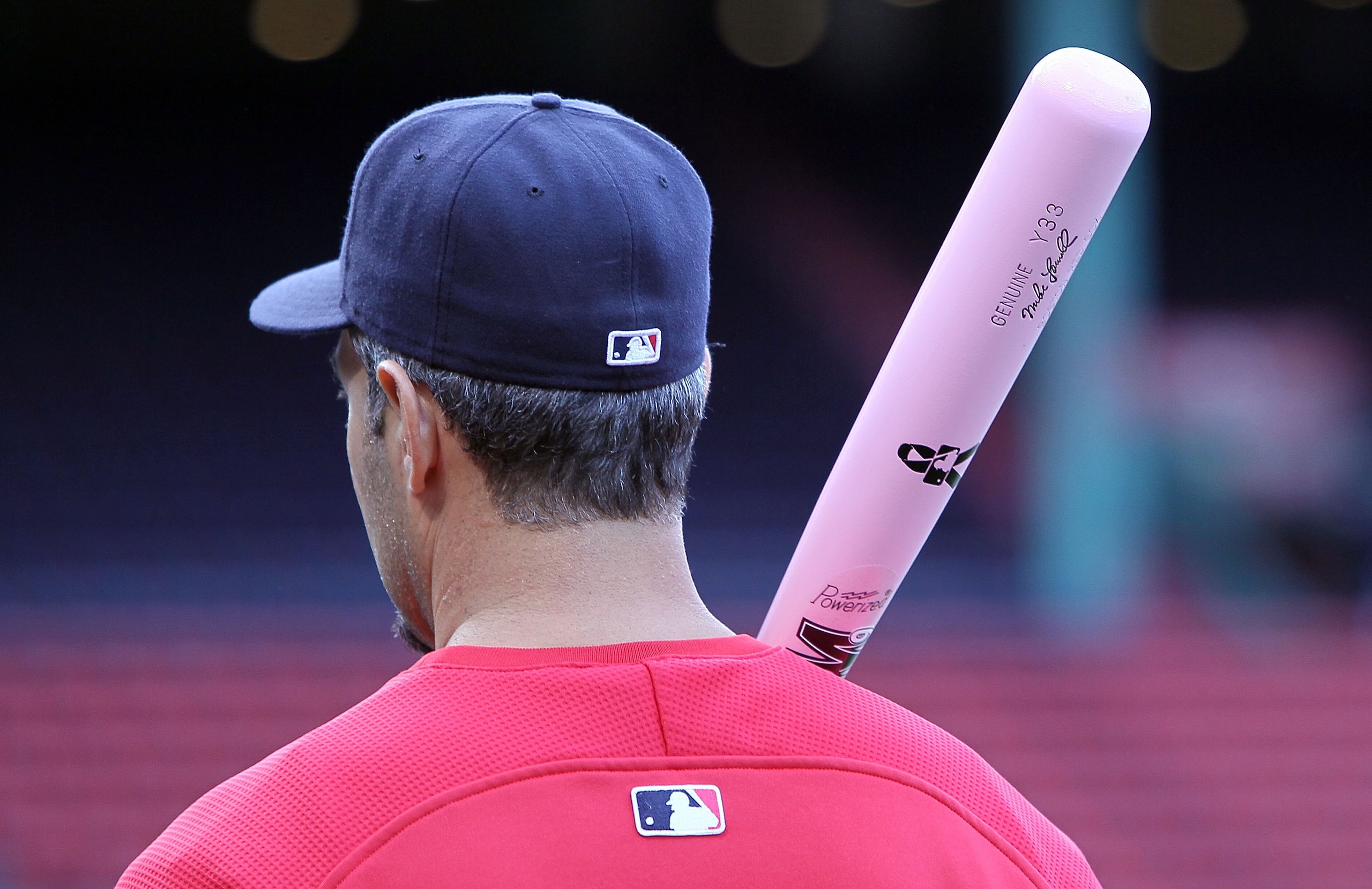 BOSTON - MAY 9:  Mike Lowell #25 of the Boston Red Sox prepares to take batting practice with a pink bat, a symbol to raise breast cancer awareness, before a game against the New York Yankees at Fenway Park on May 9, 2010 in Boston, Massachusetts. For Mot