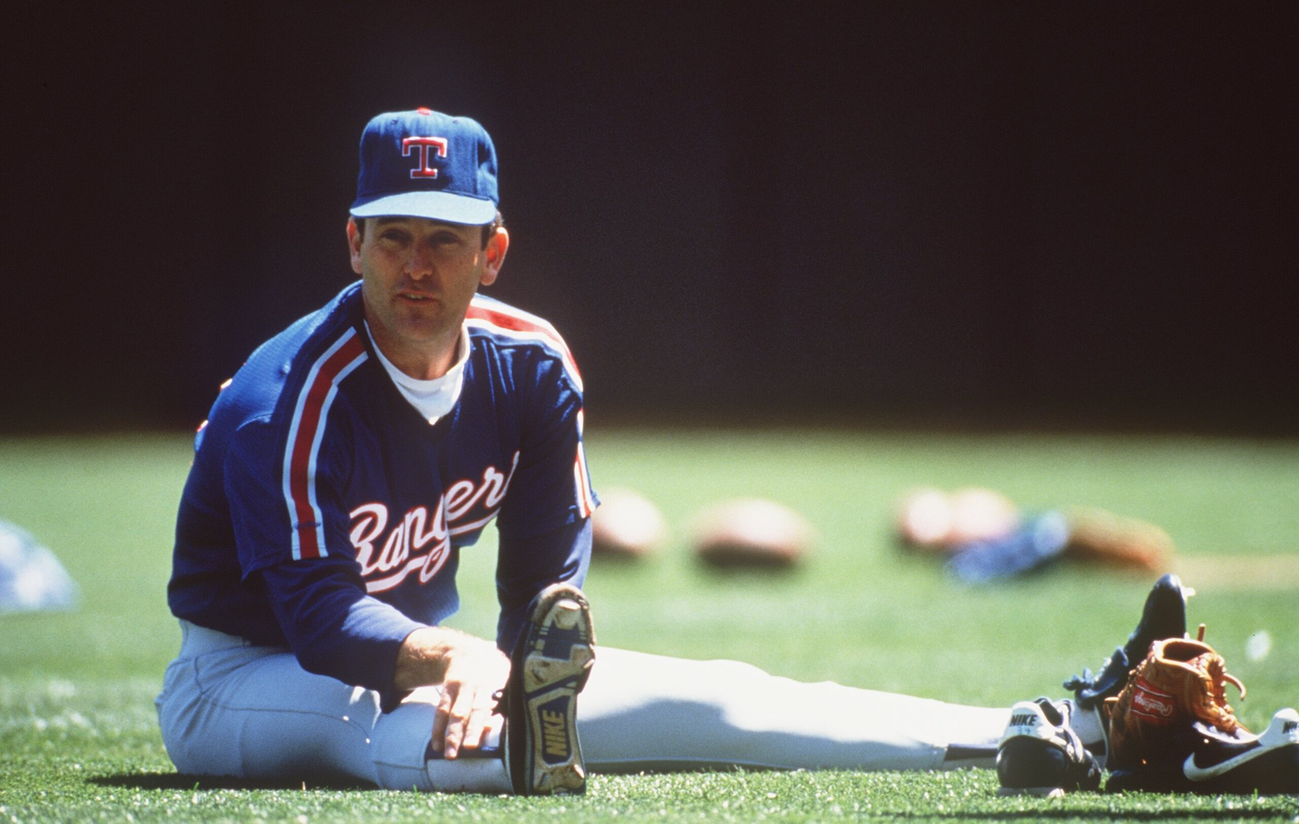 UNDATED:  TEXAS RANGERS PITCHER NOLAN RYAN STRETCHES BEFORE THROWING . Mandatory Credit: Otto Greule/ALLSPORT