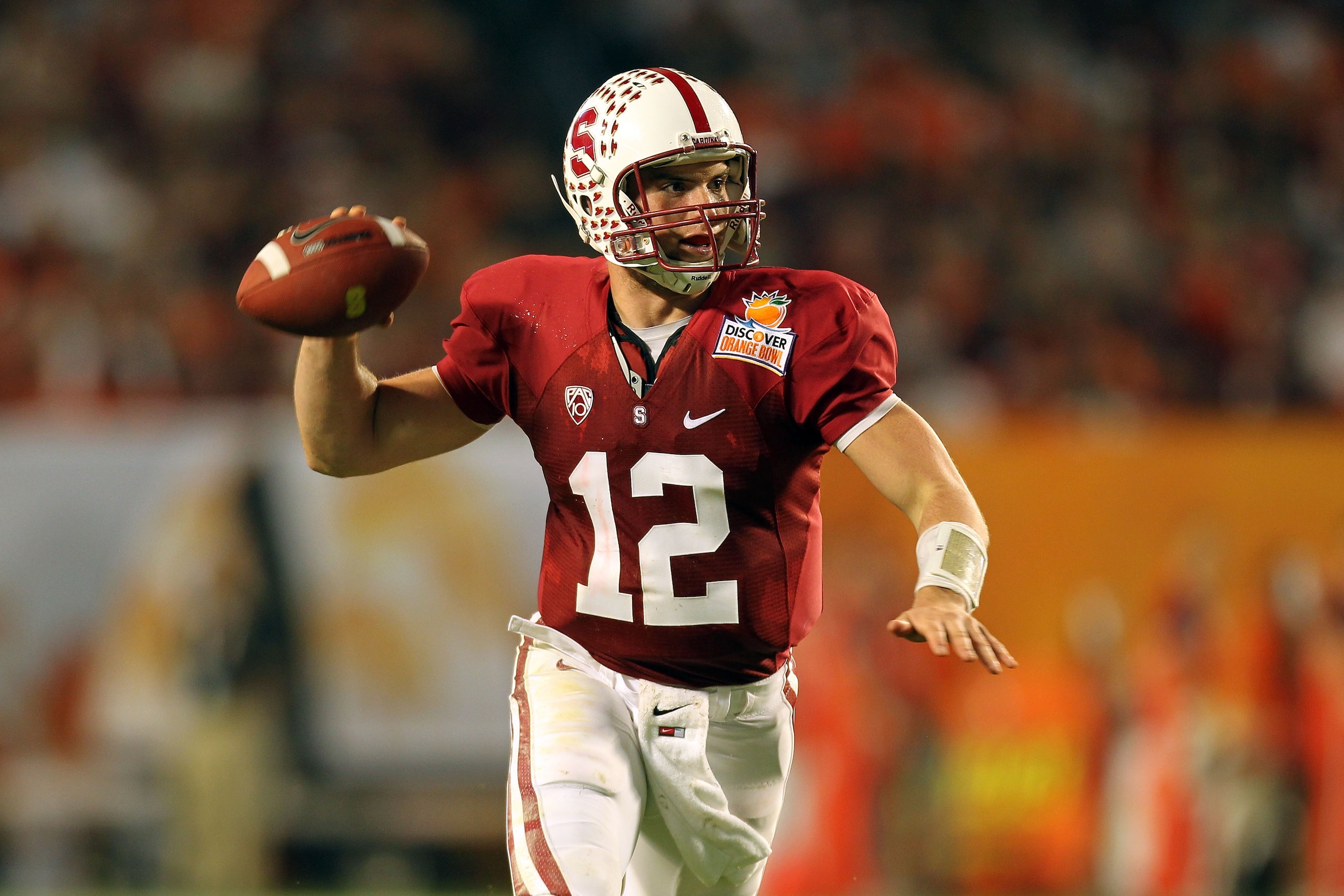 MIAMI, FL - JANUARY 03:  Andrew Luck #12 of the Stanford Cardinal throws a pass against the Virginia Tech Hokies during the 2011 Discover Orange Bowl at Sun Life Stadium on January 3, 2011 in Miami, Florida.  (Photo by Mike Ehrmann/Getty Images)
