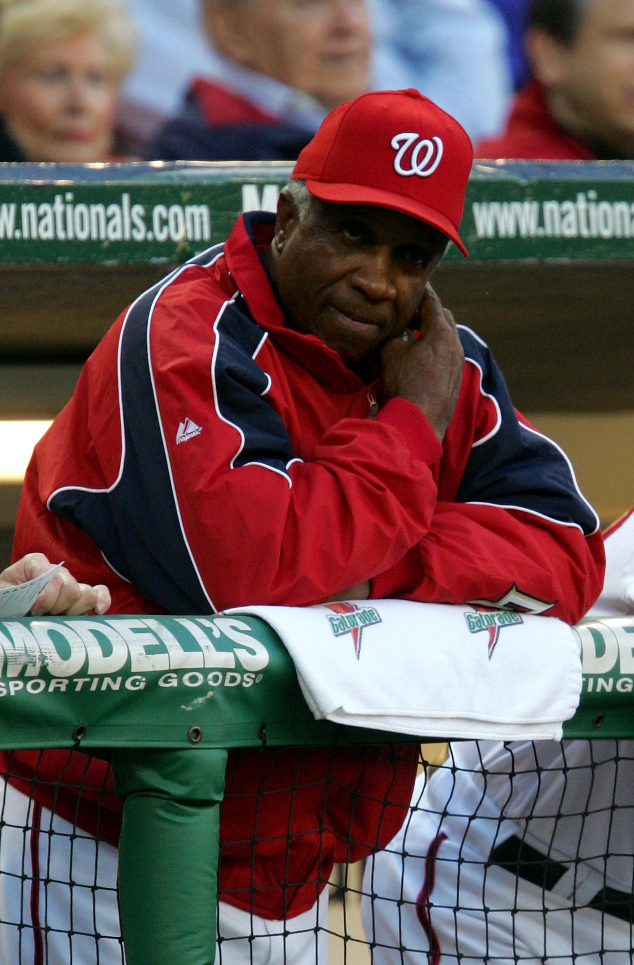 WASHINGTON - MAY 23:  Manager Frank Robinson #20 of the Washington Nationals watches from the dugout during action against the Houston Astros on May 23, 2006 at RFK Stadium in Washington, DC.  (Photo by Jamie Squire/Getty Images)