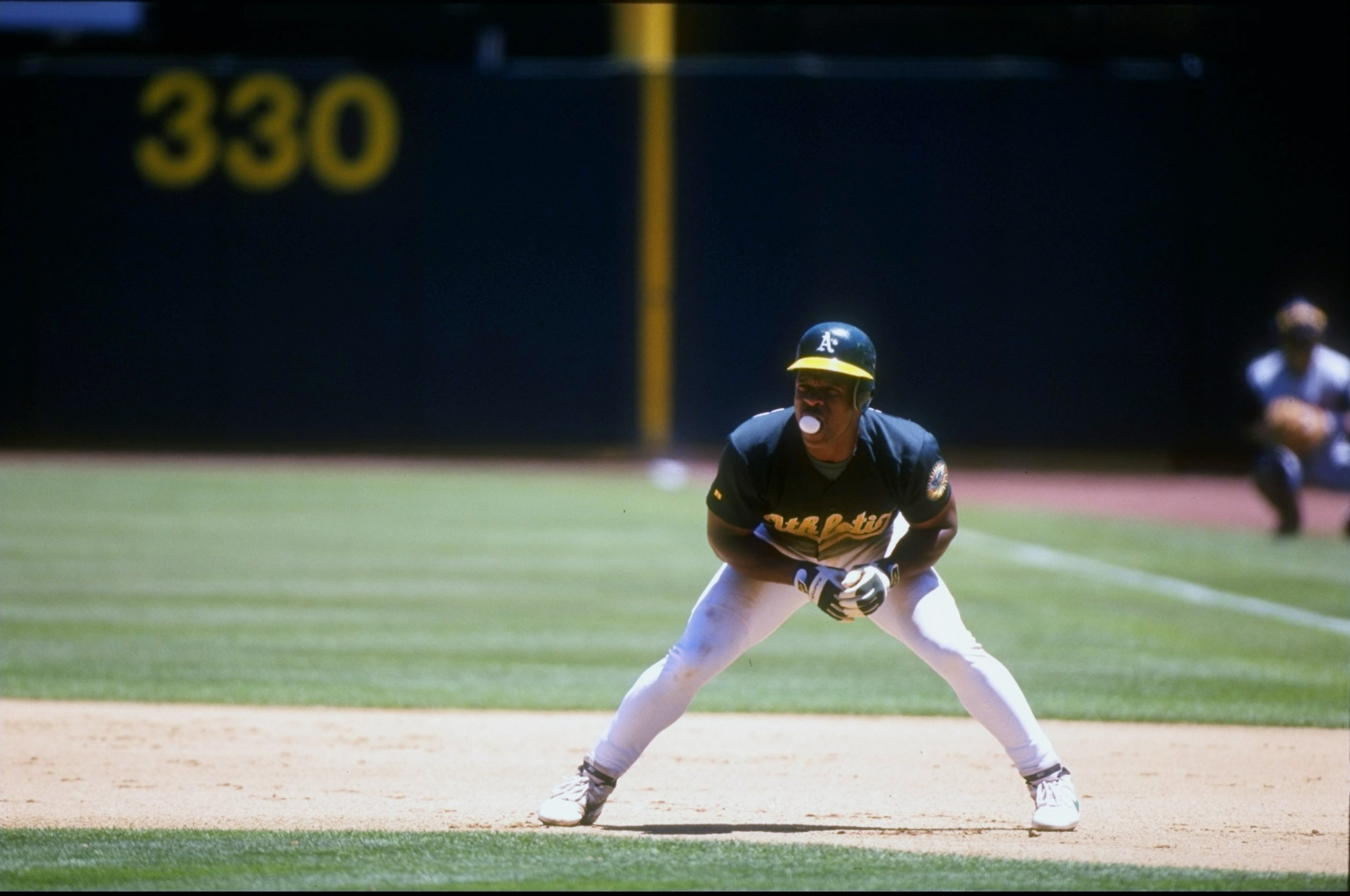 14 Jul 1998:  Outfielder Rickey Henderson #24 of the Oakland Athletics in action during a game against the Anaheim Angels at the Oakland Coliseum in Oakland, California.  The Athletics defeated the Angels 6-2. Mandatory Credit: Otto Greule Jr.  /Allsport