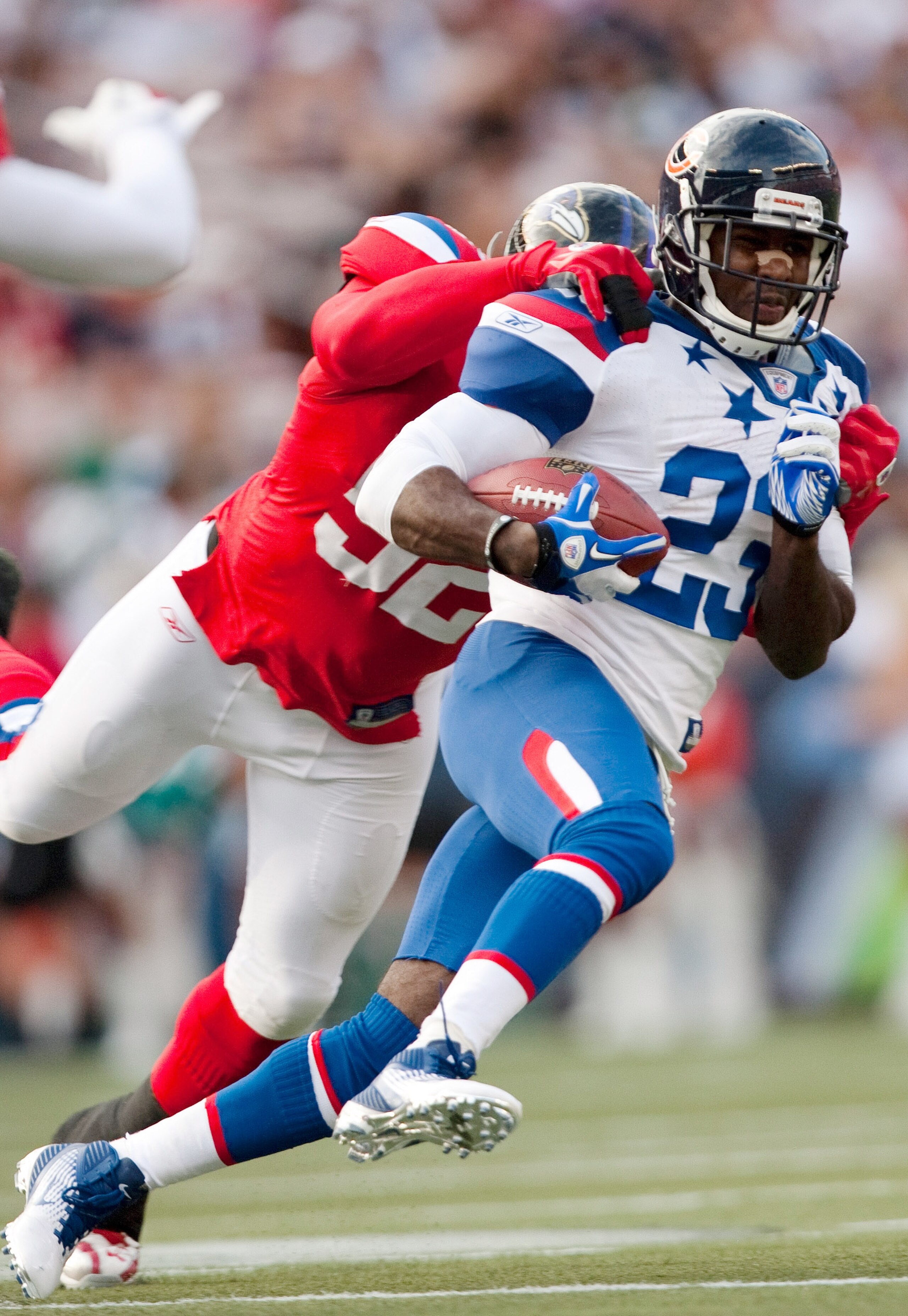 HONOLULU - JANUARY 30:  Devin Hester, #23 of the Chicago Bears, carries the ball during the 2011 NFL Pro Bowl at Aloha Stadium on January 30, 2011 in Honolulu, Hawaii. NFC won 55-41 over the AFC. (Photo by Kent Nishimura/Getty Images)