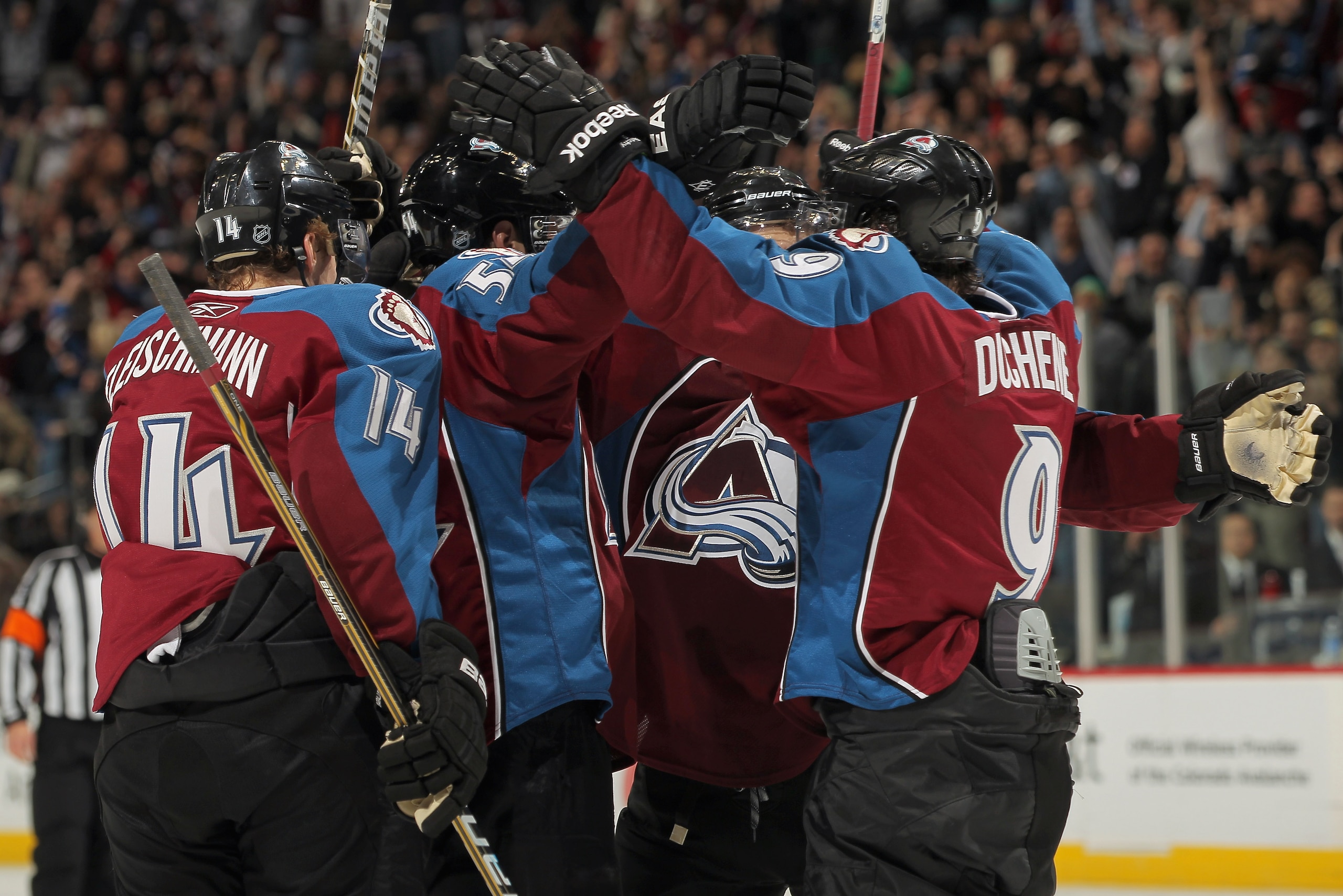 DENVER, CO - JANUARY 18:  The Colorado Avalanche celebrate their game winning goal by David Jones #54 against the Vancouver Canucks at the Pepsi Center on January 18, 2011 in Denver, Colorado. The Avalanche defeated the Canucks 4-3 in overtime.  (Photo by
