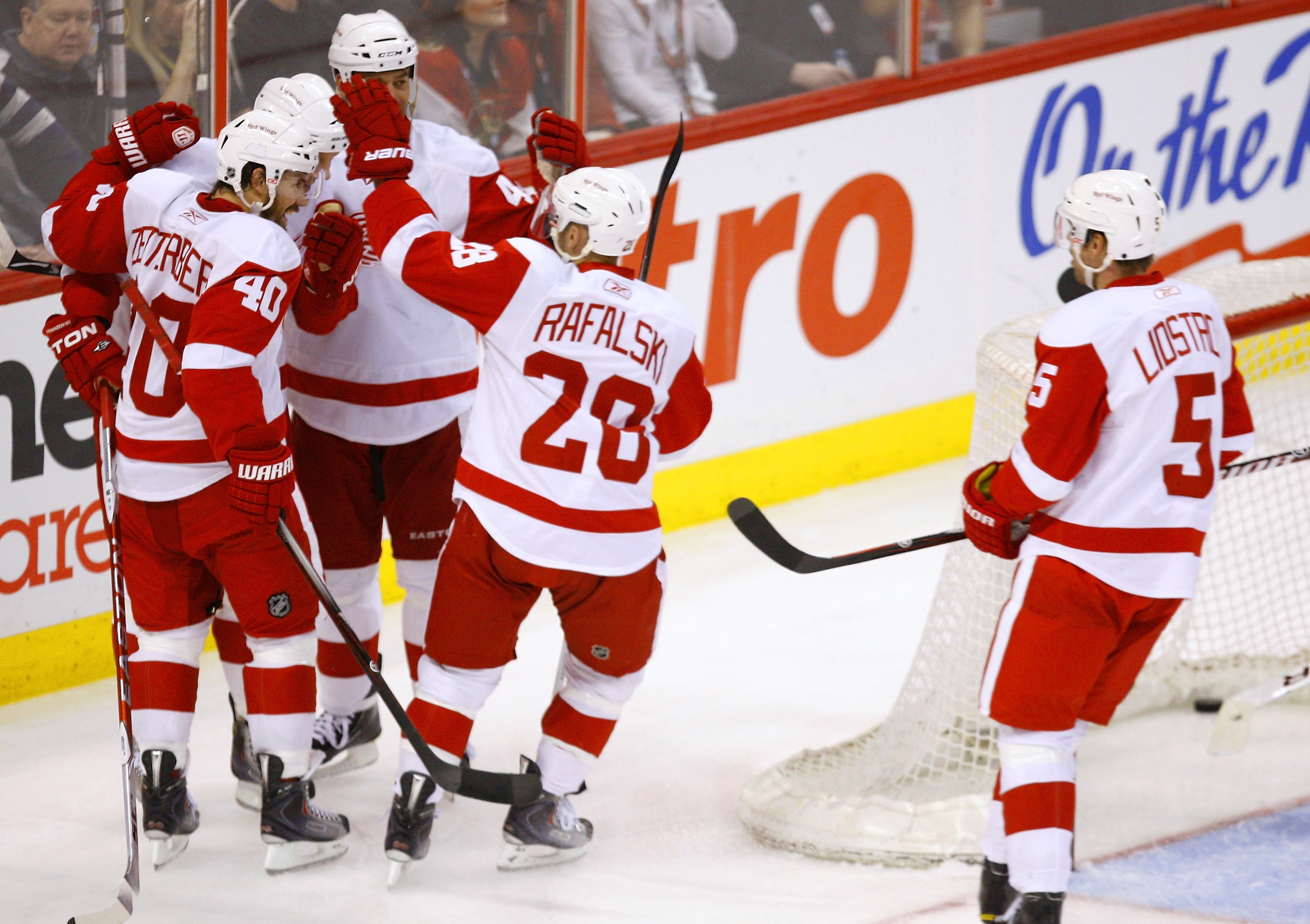 OTTAWA, ON - FEBRUARY 02:  Henrik Zetterberg #40;Johan Franzen #93;Todd Bertuzzi #44;Brian Rafalski #28 and Nicklas Lidstrom #5 of the Detroit Red Wings celebrate a goal against the Ottawa Senators in a game at Scotiabank Place on February 2, 2011 in Otta