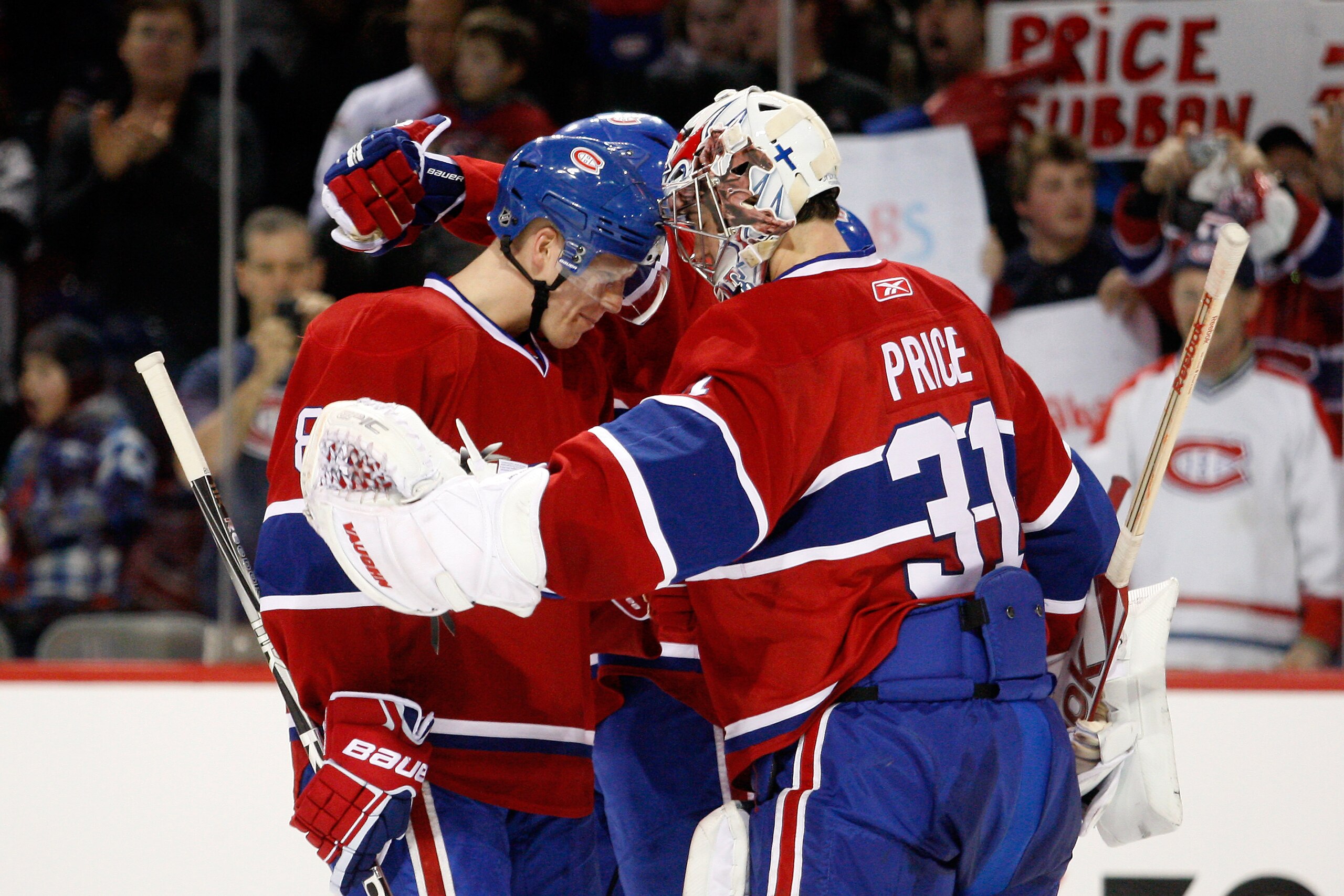MONTREAL, CANADA - FEBRUARY 5:  Lars Eller #81 of the Montreal Canadiens congratulats Carey Price #31 on his shutout victory over the New York Rangers during the NHL game at the Bell Centre on February 5, 2011 in Montreal, Quebec, Canada.  The Canadiens d