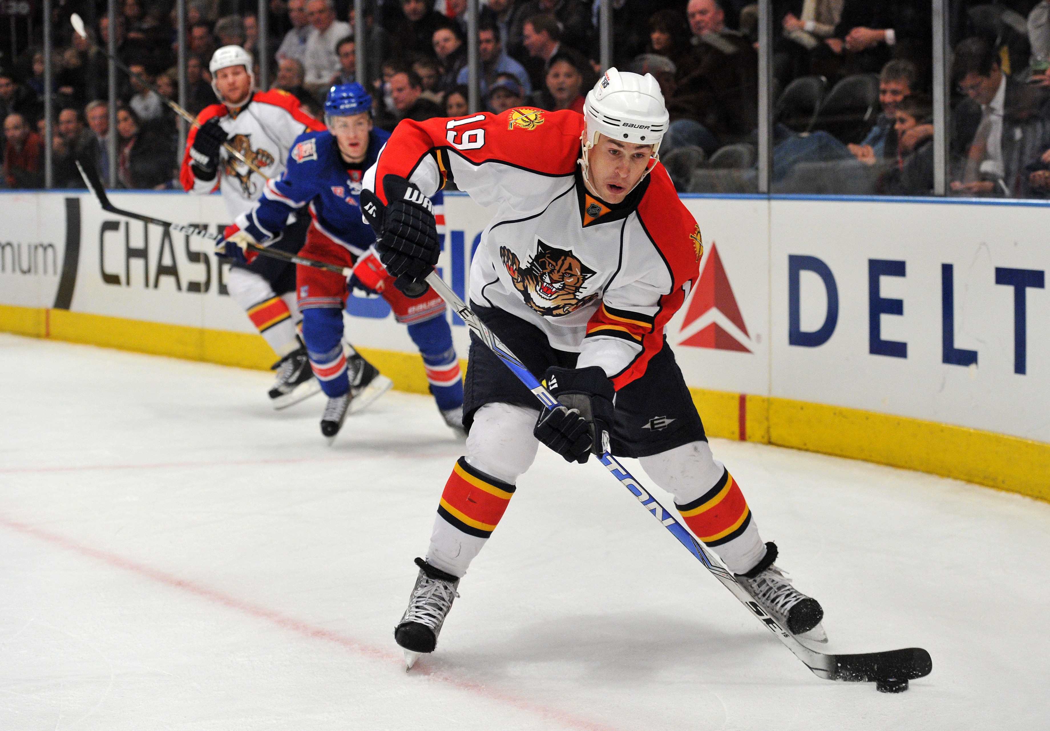 NEW YORK, NY - JANUARY 25: Marty Reasoner #19 of the Florida Panthers controls the puck during the third period against the New York Rangers at Madison Square Garden on January 25, 2011 in New York City. The Panthers defeated the 4-3. (Photo by Christophe