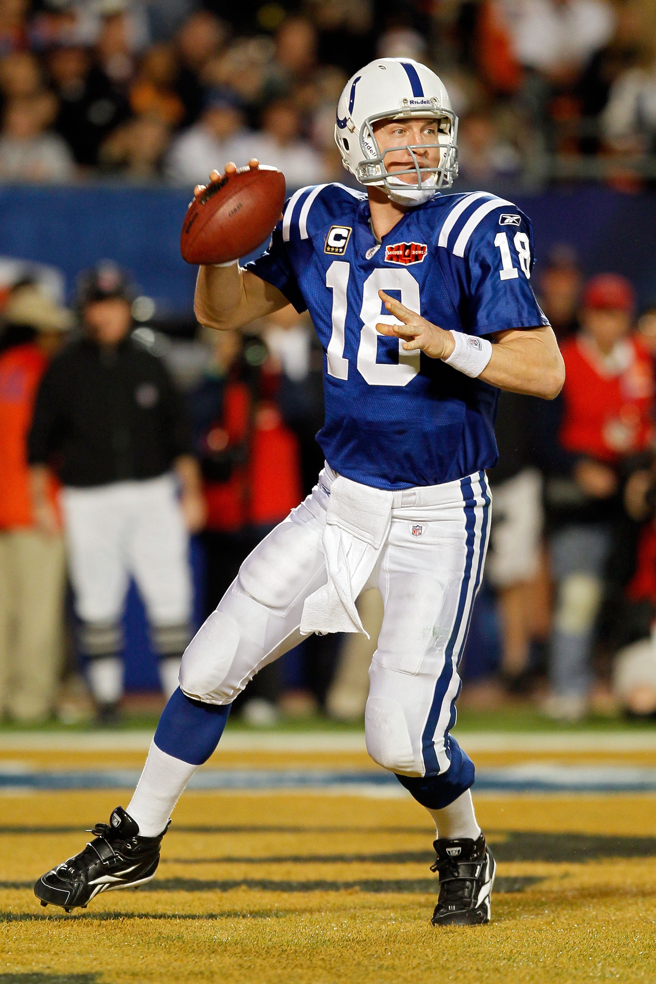 MIAMI GARDENS, FL - FEBRUARY 07:  Quarterback Peyton Manning #18 of the Indianapolis Colts drops back to pass against the New Orleans Saints during Super Bowl XLIV on February 7, 2010 at Sun Life Stadium in Miami Gardens, Florida.  (Photo by Andy Lyons/Ge