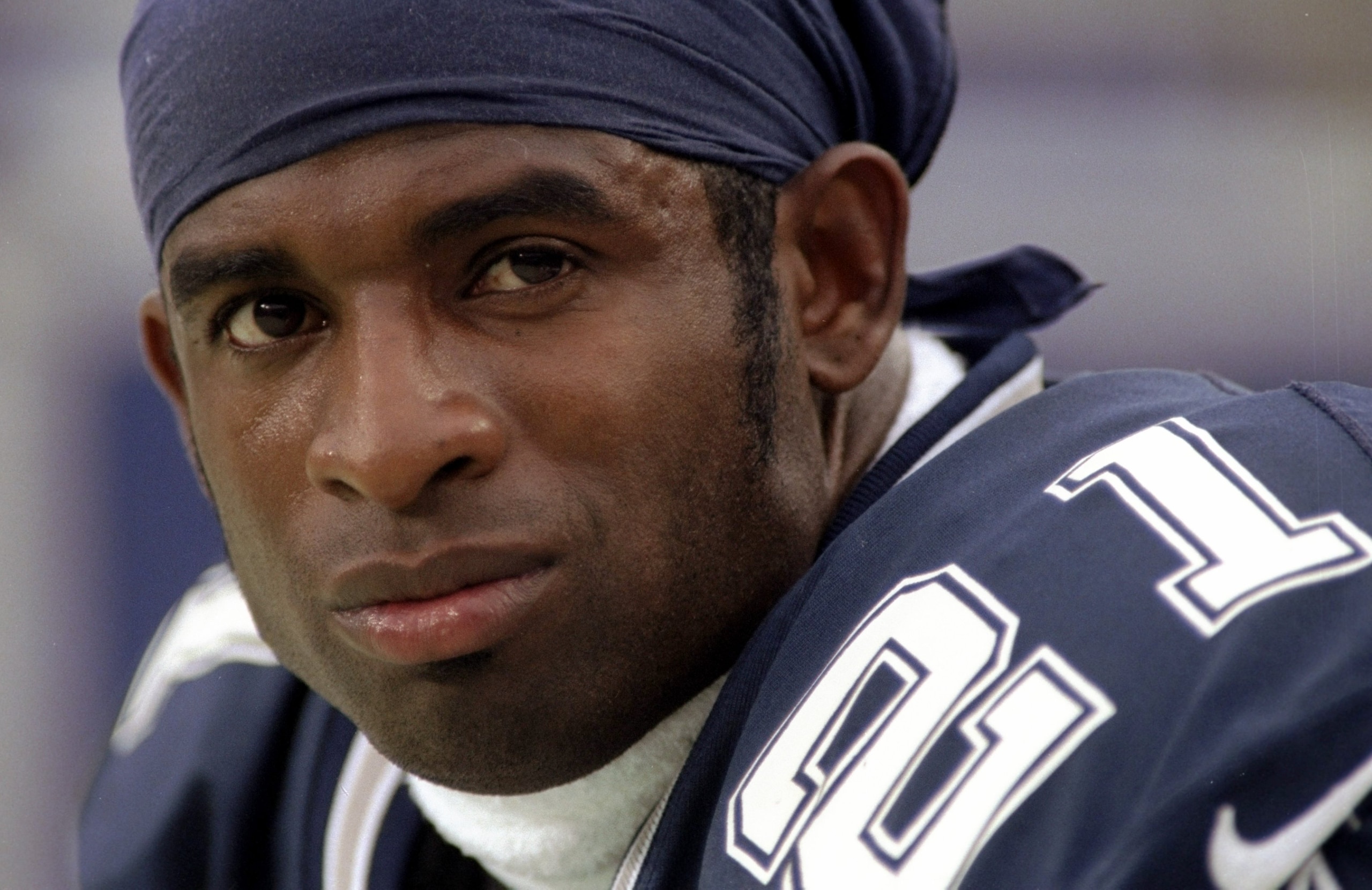 4 Oct 1998:  Deion Sanders #21 of the Dallas Cowboys looks at the camera during the game against the Washington Redskins at the Jack Kent Cooke Stadium in Washington, D.C.. The Cowboys defeated the Redskins 31-10. Mandatory Credit: Scott Halleran  /Allspo