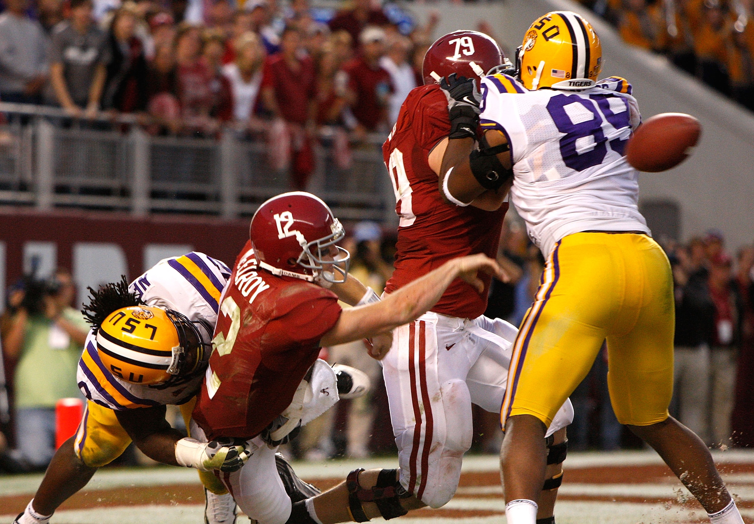 TUSCALOOSA, AL - NOVEMBER 07:  Drake Nevis #92 of the Louisiana State University Tigers sacks quarterback Greg McElroy #12 of the Alabama Crimson Tide at Bryant-Denny Stadium on November 7, 2009 in Tuscaloosa, Alabama.  McElroy was called for intentional
