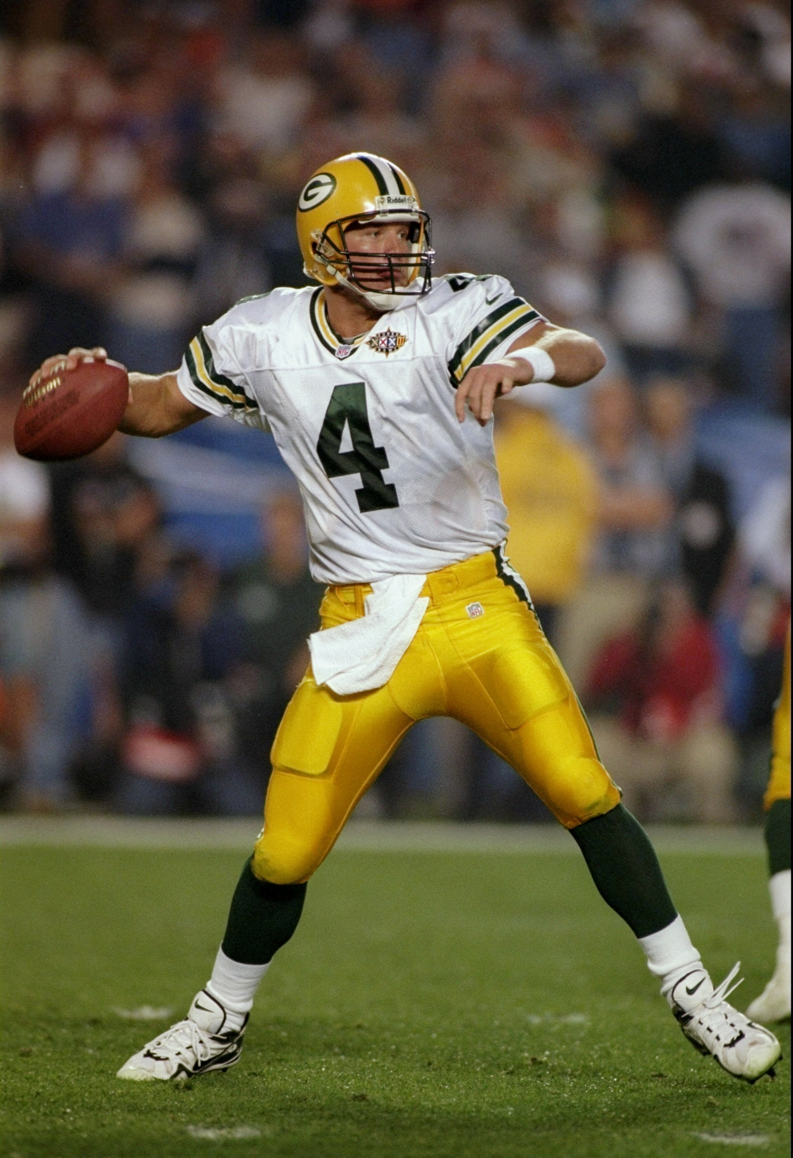 25 Jan 1998:  Brett Favre #4 of the Green Bay Packers sets to throw a pass against the Denver Broncos during Super Bowl  XXXII at Qualcomm Stadium in San Diego, California.  The Denver Broncos defeated the Green Bay Packers 31-24. Mandatory Credit: Al Bel