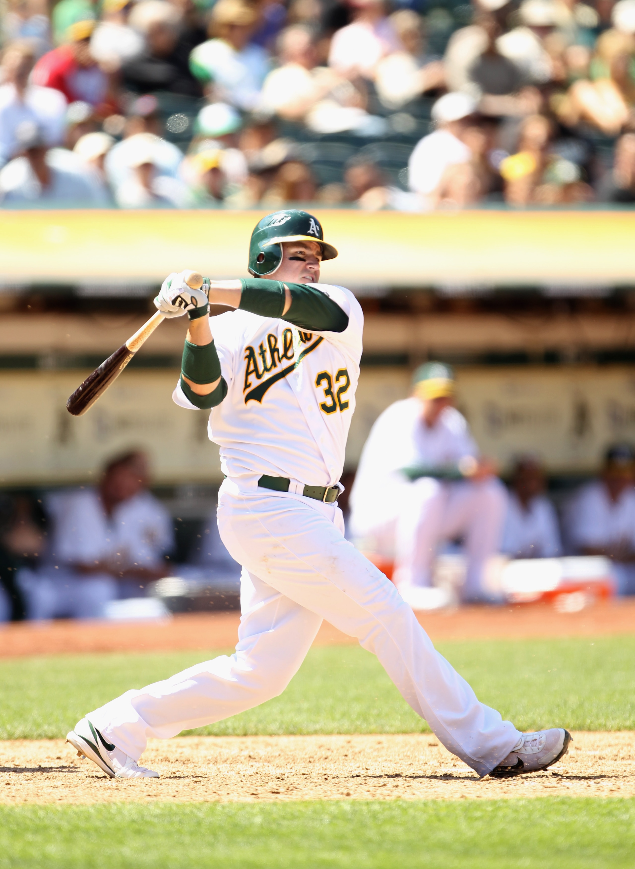 OAKLAND, CA - JULY 11:  Jack Cust #32 of the Oakland Athletics bats against the Los Angeles Angels of Anaheim at the Oakland-Alameda County Coliseum on July 11, 2010 in Oakland, California.  (Photo by Ezra Shaw/Getty Images)