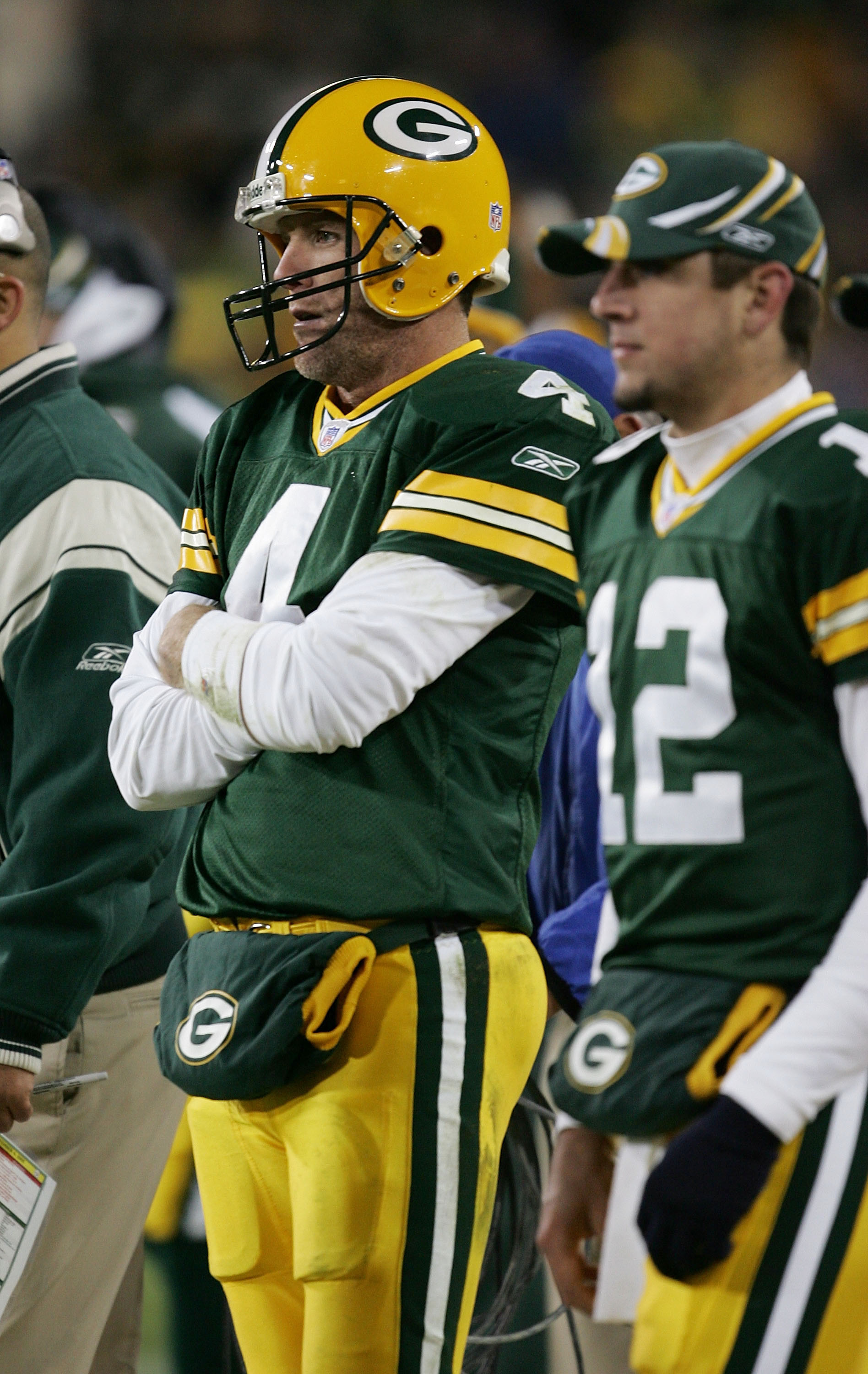 GREEN BAY, WI - NOVEMBER 6: Quarterbacks Brett Favre #4 and Aaron Rodgers #12 of the Green Bay Packers watch the final minutes of a game against the Pittsburgh Steelers from the sideline November 6, 2005 at Lambeau Field in Green Bay, Wisconsin. The Stee