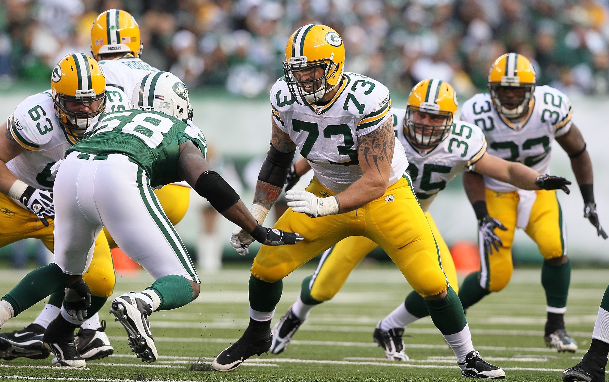EAST RUTHERFORD, NJ - OCTOBER 31: Daryn Colledge #73 of the Green Bay Packers in action against the New York Jets on October 31, 2010 at the New Meadowlands Stadium in East Rutherford, New Jersey.The Packers defeated the Jets 9-0. (Photo by Jim McIsaac/ EAST RUTHERFORD, NJ - OCTOBER 31: Daryn Colledge #73 of the Green Bay Packers in action against the New York Jets on October 31, 2010 at the New Meadowlands Stadium in East Rutherford, New Jersey.The Packers defeated the Jets 9-0. (Photo by Jim McIsaac/