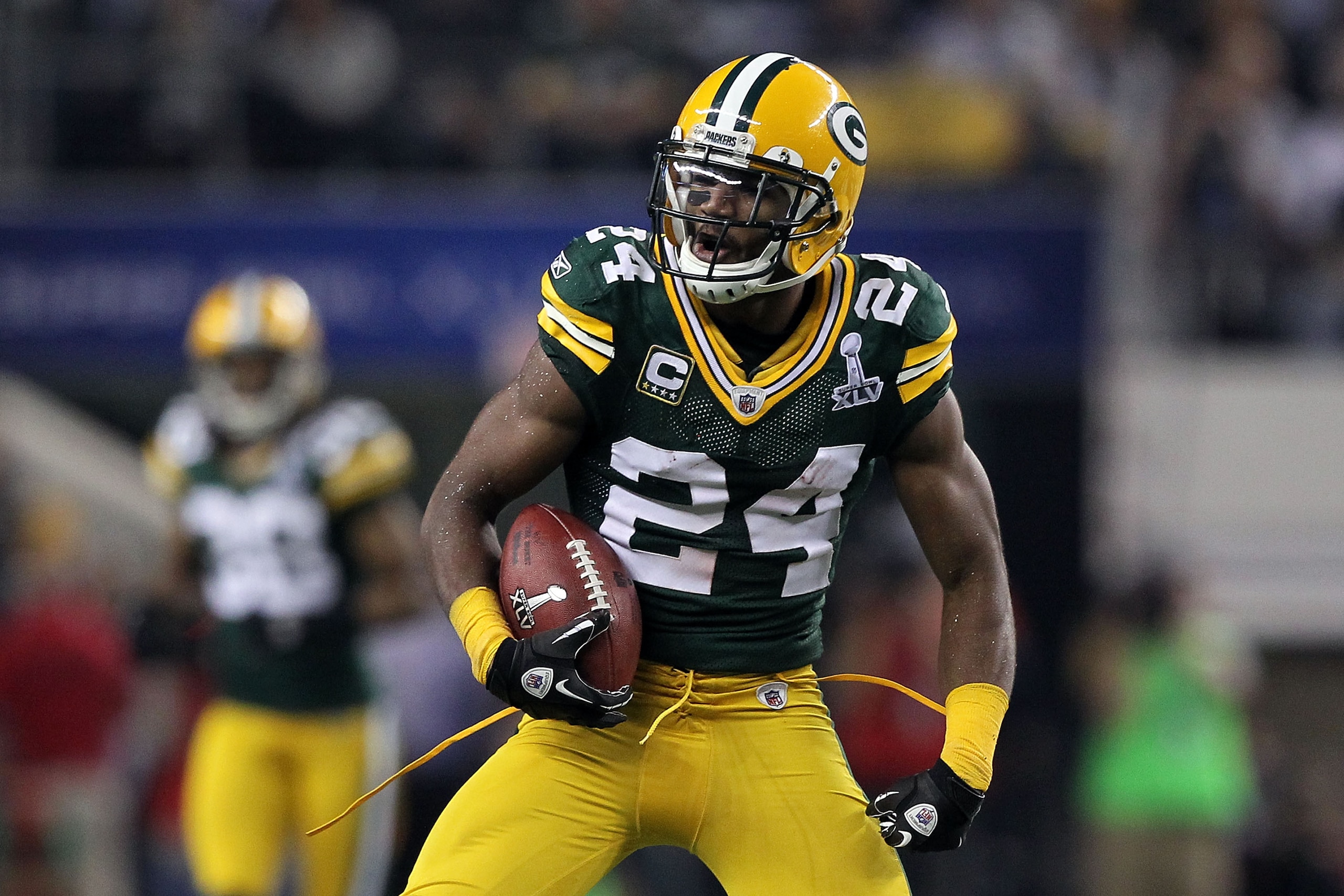 ARLINGTON, TX - FEBRUARY 06: Jarrett Bush #24 of the Green Bay Packers celebrates after intercepting Ben Roethlisberger #7 of the Pittsburgh Steelers during Super Bowl XLV at Cowboys Stadium on February 6, 2011 in Arlington, Texas. (Photo by Al Bello/Get ARLINGTON, TX - FEBRUARY 06: Jarrett Bush #24 of the Green Bay Packers celebrates after intercepting Ben Roethlisberger #7 of the Pittsburgh Steelers during Super Bowl XLV at Cowboys Stadium on February 6, 2011 in Arlington, Texas. (Photo by Al Bello/Get