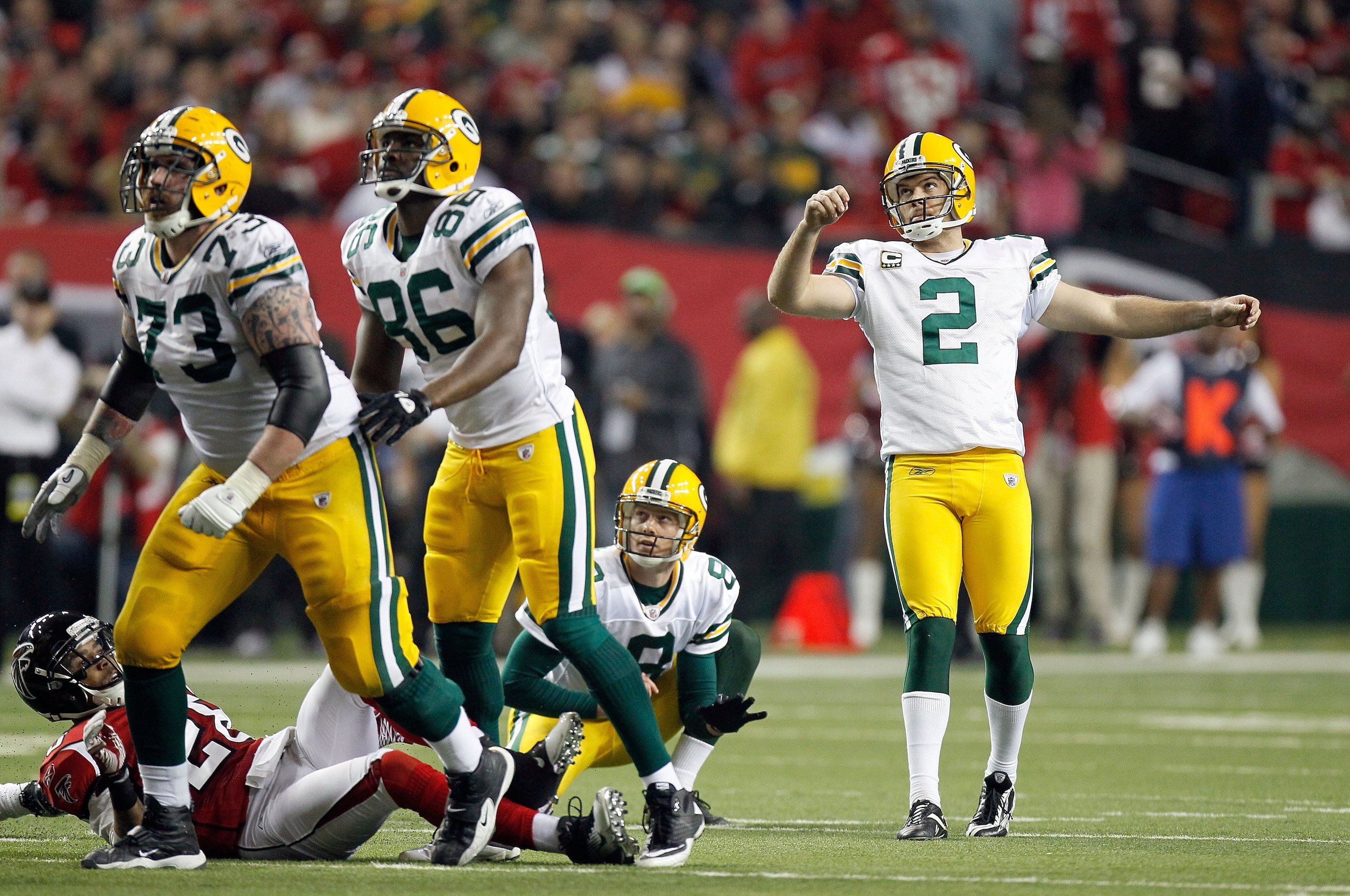 ATLANTA, GA - JANUARY 15: Mason Crosby #2 of the Green Bay Packers watches his kick attempt against the Atlanta Falcons during their 2011 NFC divisional playoff game at Georgia Dome on January 15, 2011 in Atlanta, Georgia. (Photo by Kevin C. Cox/Getty I ATLANTA, GA - JANUARY 15: Mason Crosby #2 of the Green Bay Packers watches his kick attempt against the Atlanta Falcons during their 2011 NFC divisional playoff game at Georgia Dome on January 15, 2011 in Atlanta, Georgia. (Photo by Kevin C. Cox/Getty I