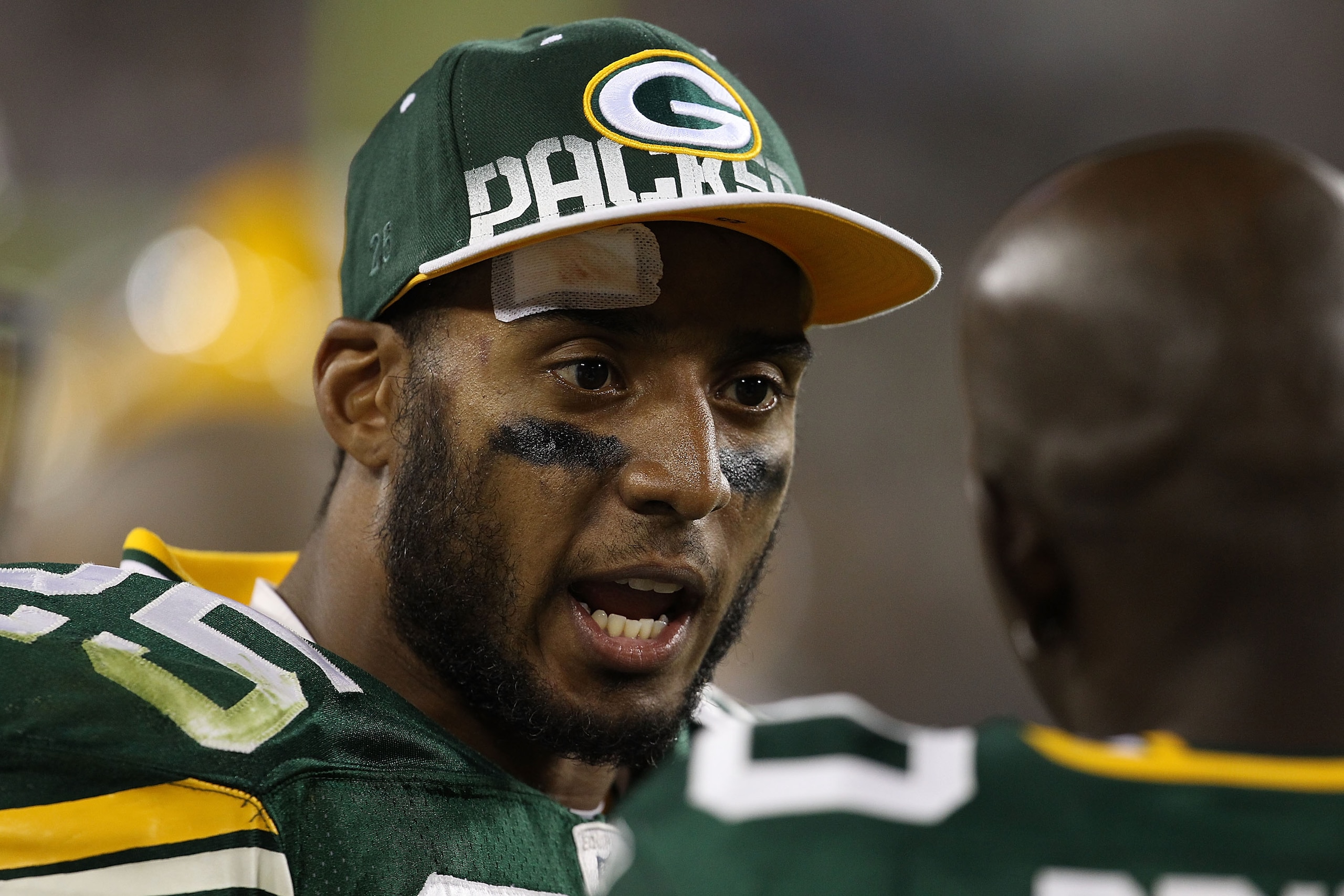 GREEN BAY, WI - AUGUST 26: Ryan Grant #25 of the Green Bay Packers talks with teammate Donald Driver #80 on the sidelines during a preseason game against the Indianapolis Colts at Lambeau Field on August 26, 2010 in Green Bay, Wisconsin. The Packers defea GREEN BAY, WI - AUGUST 26: Ryan Grant #25 of the Green Bay Packers talks with teammate Donald Driver #80 on the sidelines during a preseason game against the Indianapolis Colts at Lambeau Field on August 26, 2010 in Green Bay, Wisconsin. The Packers defea