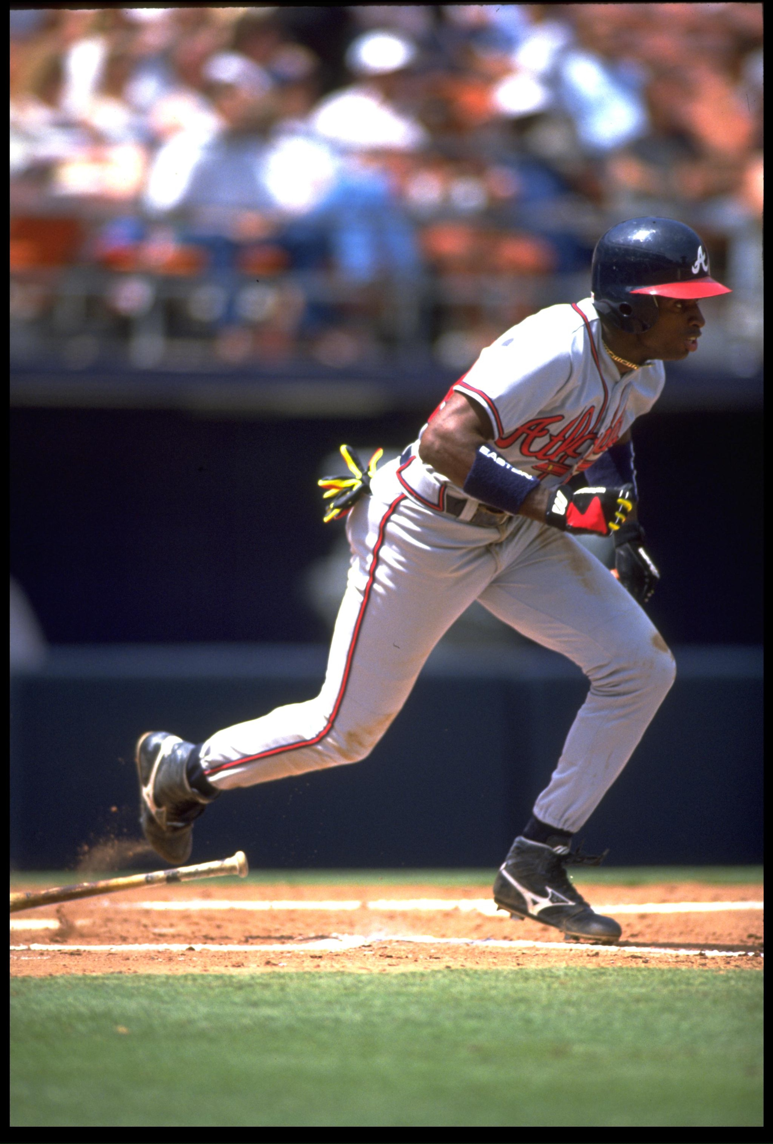 22 APR 1992:  ATLANTA BRAVES OUTFIELDER DEION SANDERS RUNS TO FIRST BASE AFTER MAKING CONTACT WITH A PITCH DURING THE BRAVES VERSUS SAN DIEGO PADRES GAME AT JACK MURPHY STADIUM IN SAN DIEGO, CALIFORNIA.  MANDATORY CREDIT:  STEPHEN DUNN/ALLSPORT
