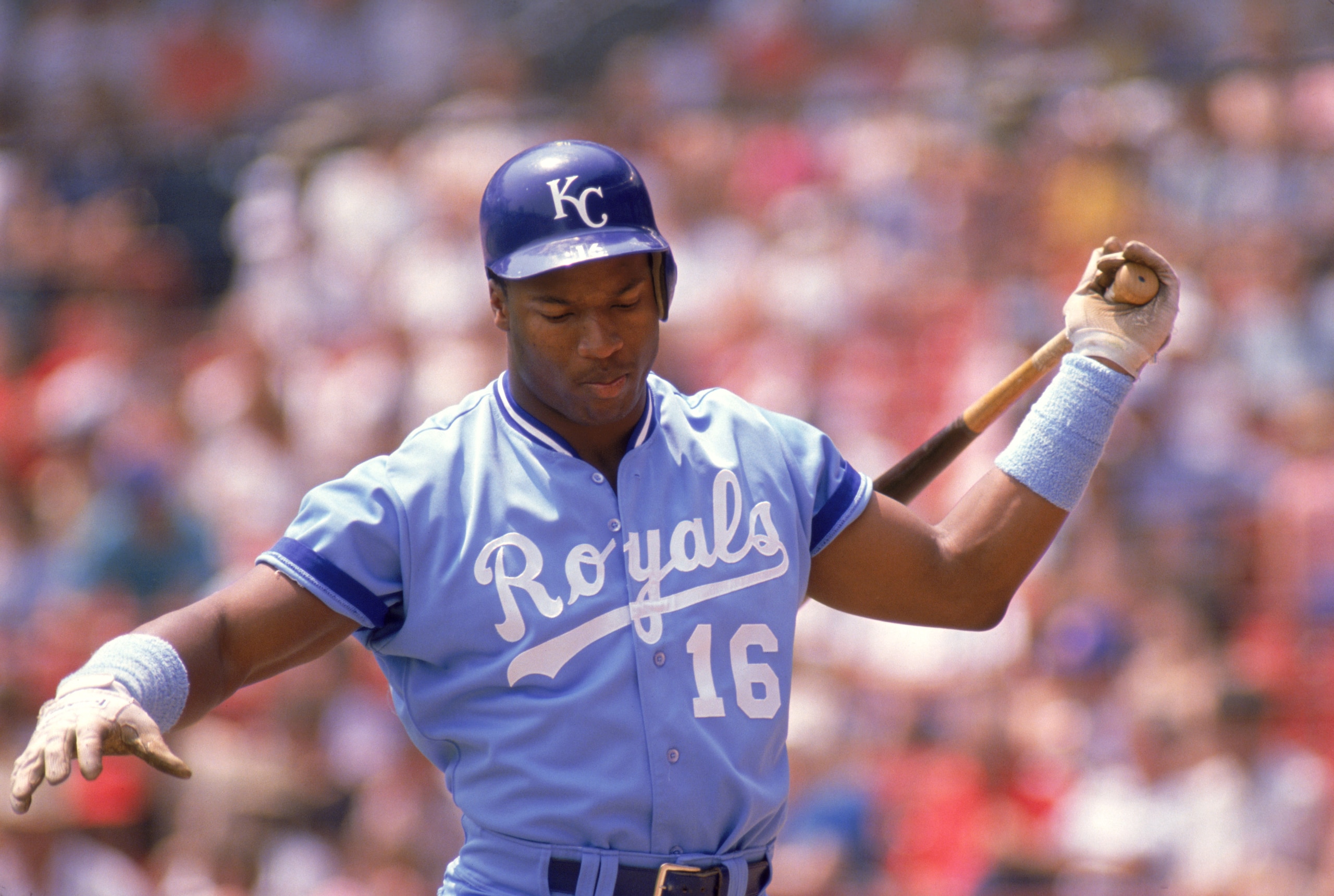 1989:  Bo Jackson #16 of the Kansas City Royals practices his swing as he prepares to bat during a game in the 1989 season.  (Photo by Jonathan Daniel/Getty Images)