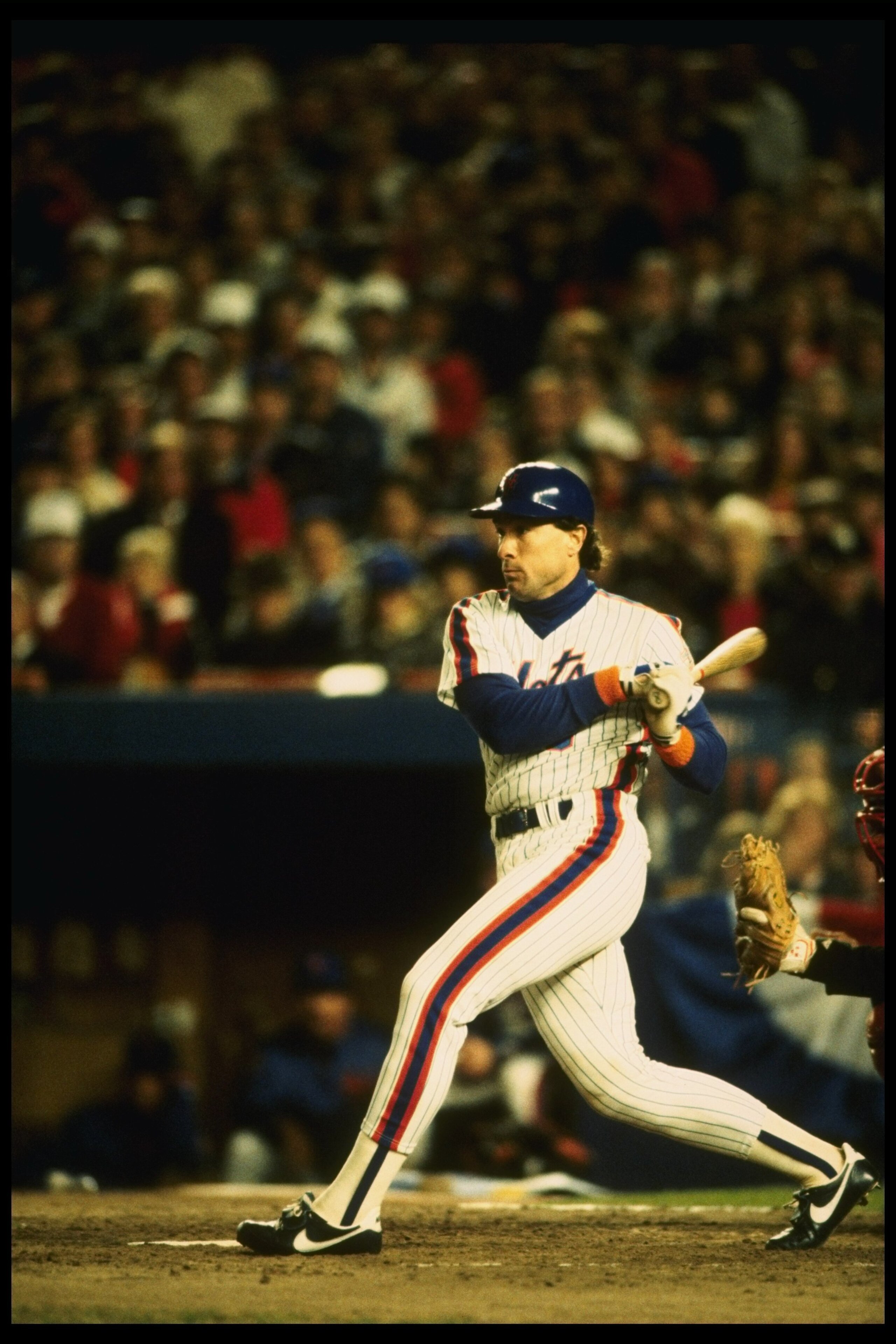 27 Oct 1986:  Gary Carter of the New York Mets makes contact with a pitch during the Mets 8-5 win over the Boston Red Sox in game 7 of the World Series at Shea Stadium in Flushing, New York.  The Mets won the series 4 games to 3. Mandatory Credit: T. G. H