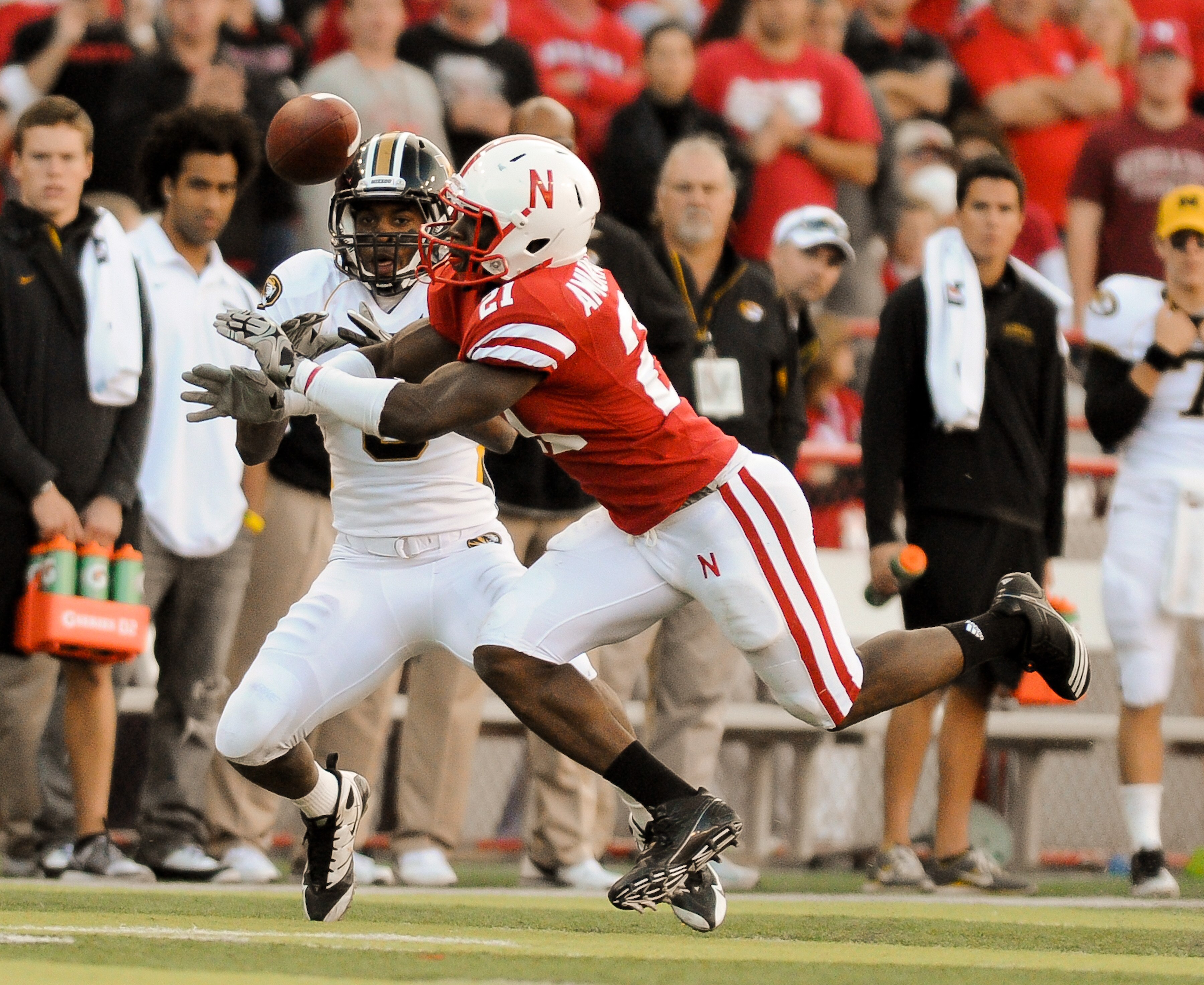 LINCOLN, NE - OCTOBER 30: Cornerback Prince Amukamara #21 of the Nebraska Cornhuskers breaks up a pass intended wide receiver Wes Kemp #8 of the during second half action of their game at Memorial Stadium on October 30, 2010 in Lincoln, Nebraska. Nebraska