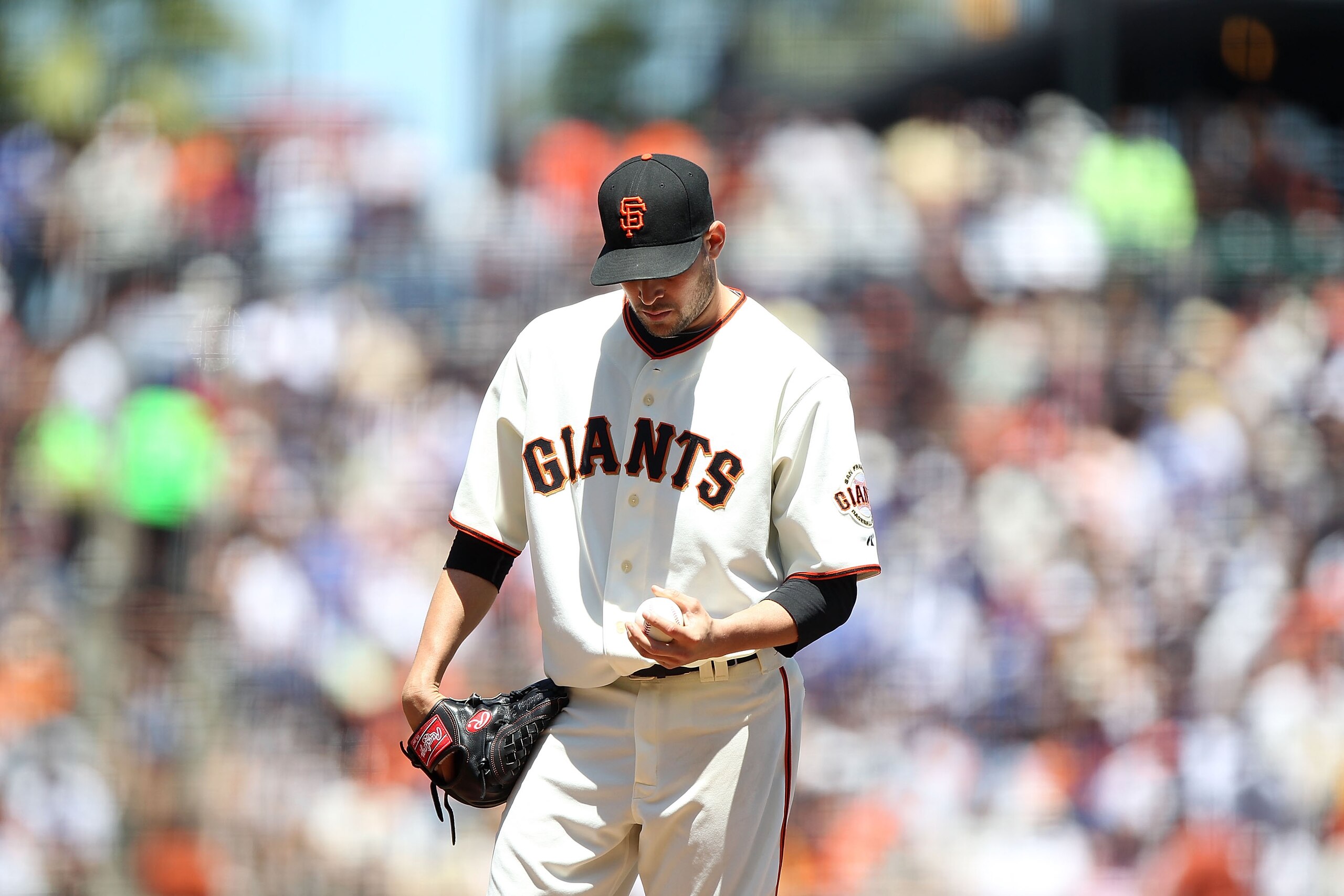 SAN FRANCISCO - JUNE 30:  Jonathan Sanchez #57 of the San Francisco Giants looks on after giving up a home run to Rafael Furcal of the Los Angeles Dodgers in  the fifth inning during an MLB game at AT&T Park on June 30, 2010 in San Francisco, California.