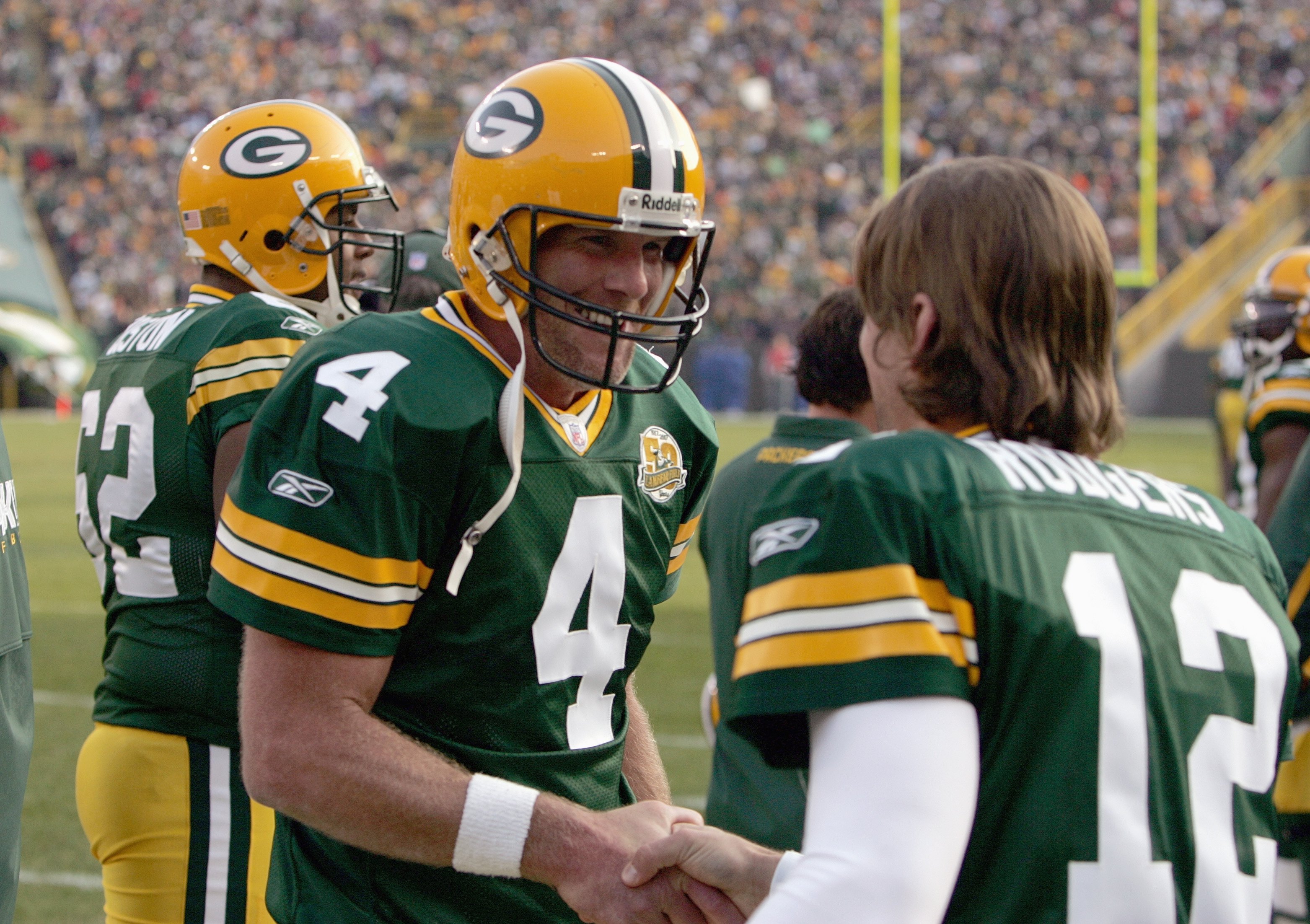 GREEN BAY, WI - NOVEMBER 11: Brett Favre #4 of the Green Bay Packers talks with Aaron Rodgers #12 during the game against the Minnesota Vikings give chase on November 11, 2007 at Lambeau Field in Green Bay, Wisconsin. (Photo by Jonathan Daniel/Getty Imag