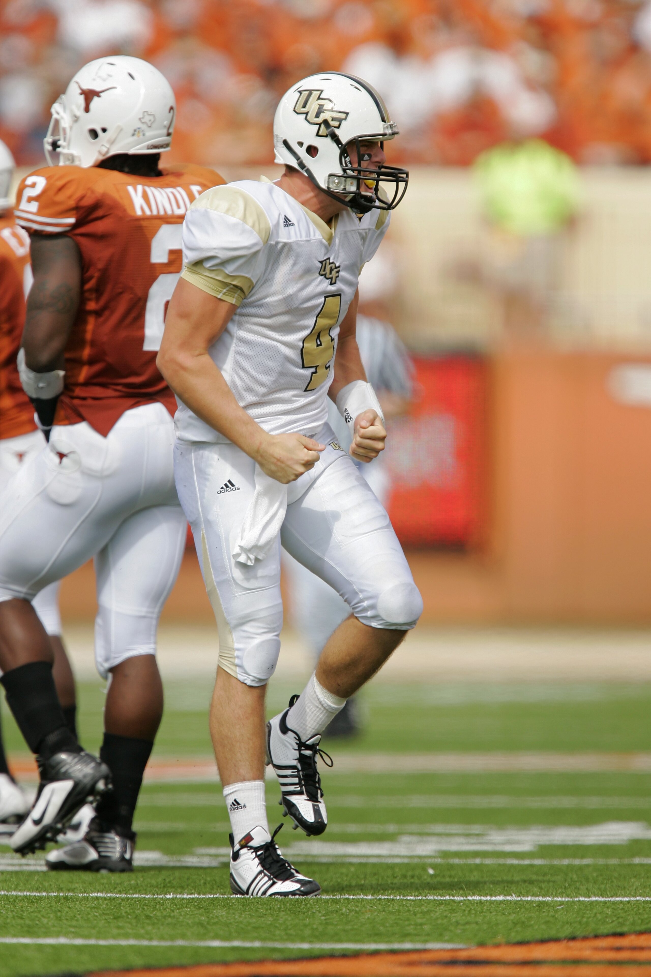 AUSTIN, TX - NOVEMBER 07: Quarterback Rob Calabrese #4 of the UCF Knights celebrates a first down against the Texas Longhorns on November 7, 2009 at Darrell K Royal - Texas Memorial Stadium in Austin, Texas. Texas won 35-3. (Photo by Brian Bahr/Getty I AUSTIN, TX - NOVEMBER 07: Quarterback Rob Calabrese #4 of the UCF Knights celebrates a first down against the Texas Longhorns on November 7, 2009 at Darrell K Royal - Texas Memorial Stadium in Austin, Texas. Texas won 35-3. (Photo by Brian Bahr/Getty I