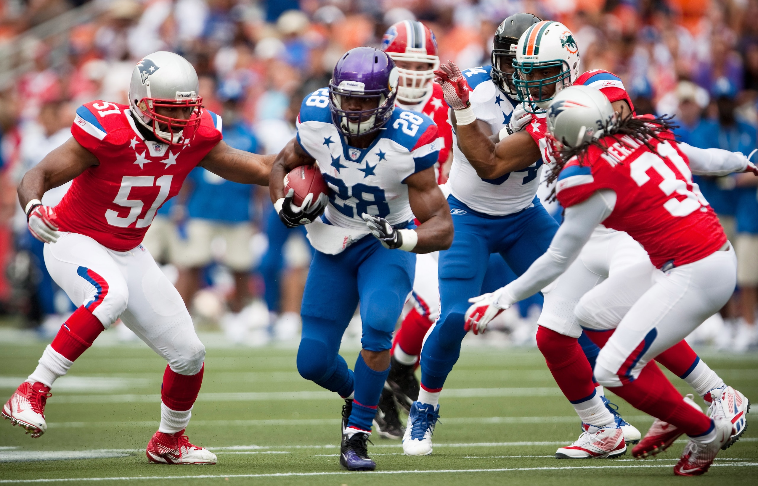 HONOLULU - JANUARY 30:  Adrian Peterson, #28 of the Minnesota Vikings, carries the ball during the 2011 NFL Pro Bowl at Aloha Stadium on January 30, 2011 in Honolulu, Hawaii. NFC won 55-41 over the AFC. (Photo by Kent Nishimura/Getty Images)