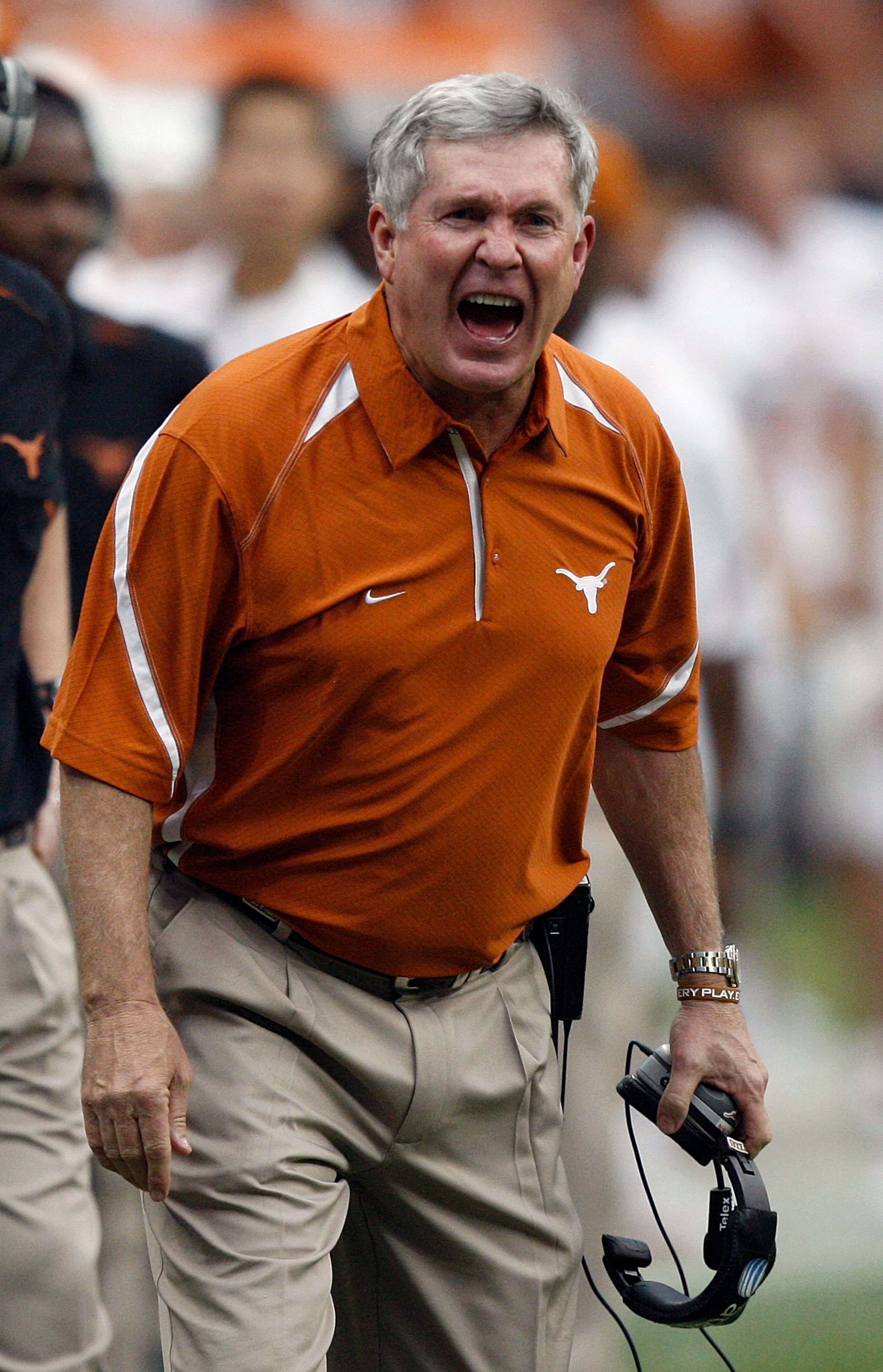 HOUSTON - SEPTEMBER 04: Mack Brown, head coach of the Texas Longhorns yells at the officials after a delay of game was called in the third quarter during a game against the Rice Owls at Reliant Stadium on September 4, 2010 in Houston, Texas. Texas beat R HOUSTON - SEPTEMBER 04: Mack Brown, head coach of the Texas Longhorns yells at the officials after a delay of game was called in the third quarter during a game against the Rice Owls at Reliant Stadium on September 4, 2010 in Houston, Texas. Texas beat R