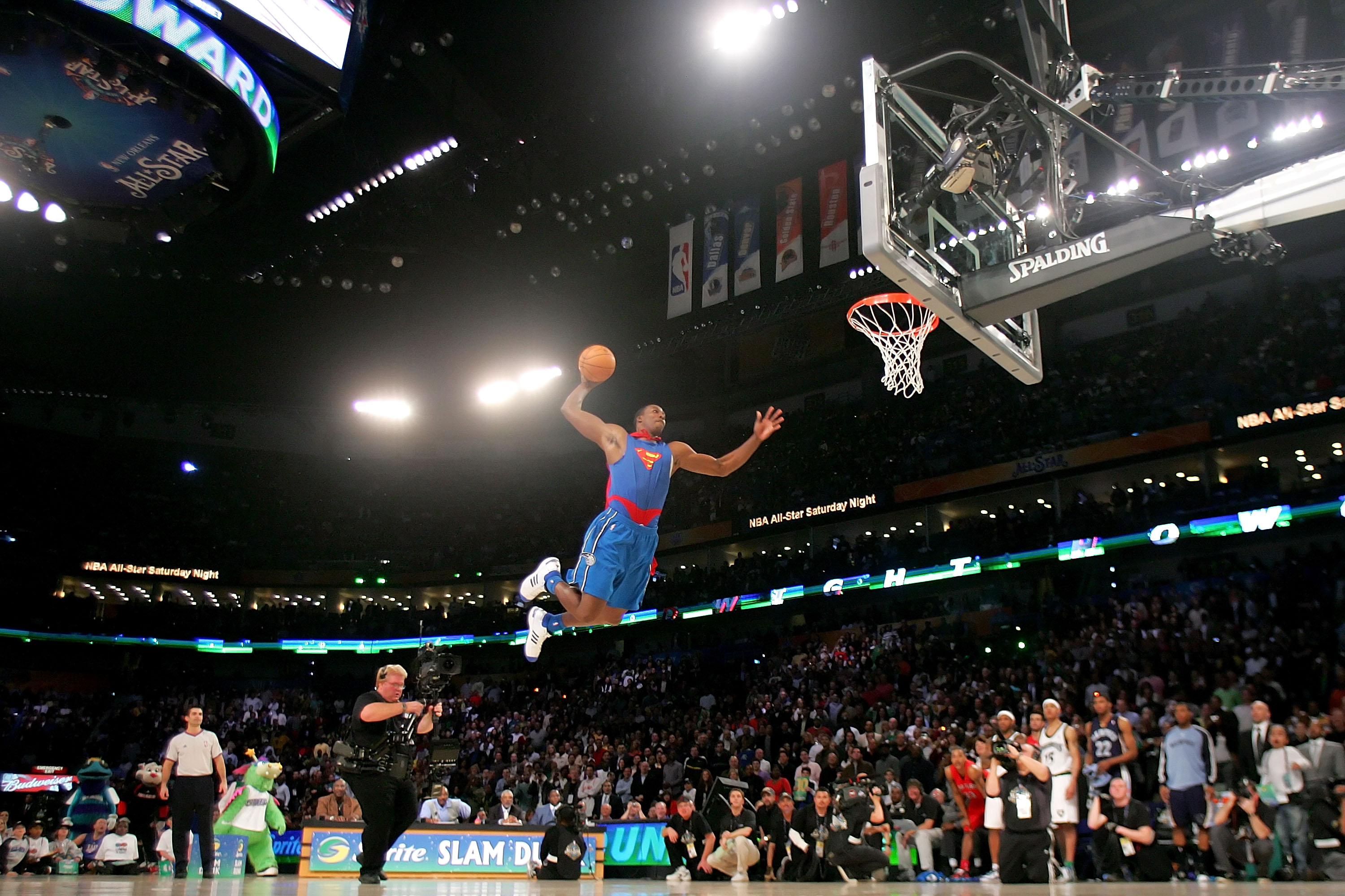 NEW ORLEANS - FEBRUARY 16:  Dwight Howard of the Orlando Magic completes a dunk in the Sprite Slam Dunk Contest, part of 2008 NBA All-Star Weekend at the New Orleans Arena on February 16, 2008 in New Orleans, Louisiana.  NOTE TO USER: User expressly ackno