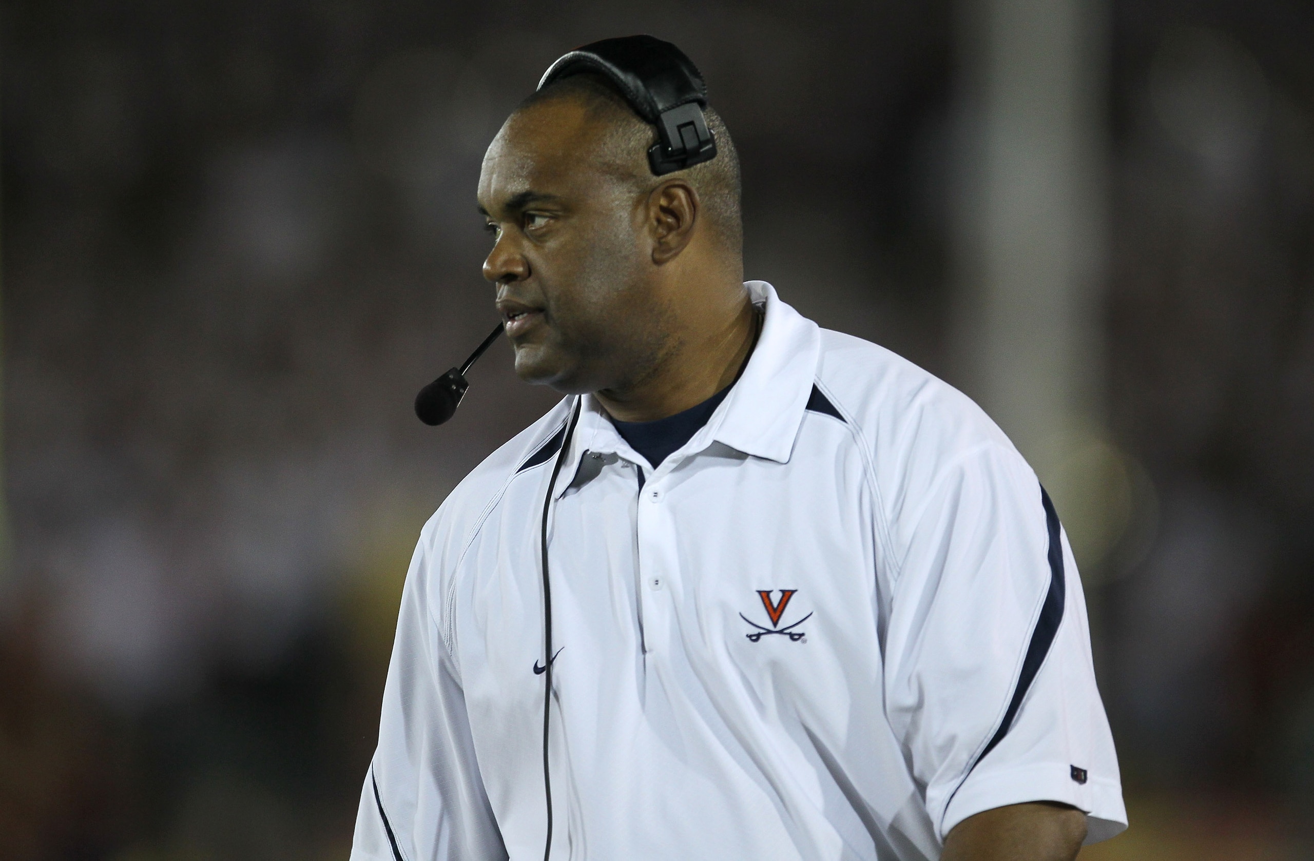 LOS ANGELES, CA - SEPTEMBER 11: Head coach Mike London of the Virginia Cavaliers on the sidelines during the game against the USC Trojans at Los Angeles Memorial Coliseum on September 11, 2010 in Los Angeles, California. USC won 17-14. (Photo by Stephen LOS ANGELES, CA - SEPTEMBER 11: Head coach Mike London of the Virginia Cavaliers on the sidelines during the game against the USC Trojans at Los Angeles Memorial Coliseum on September 11, 2010 in Los Angeles, California. USC won 17-14. (Photo by Stephen