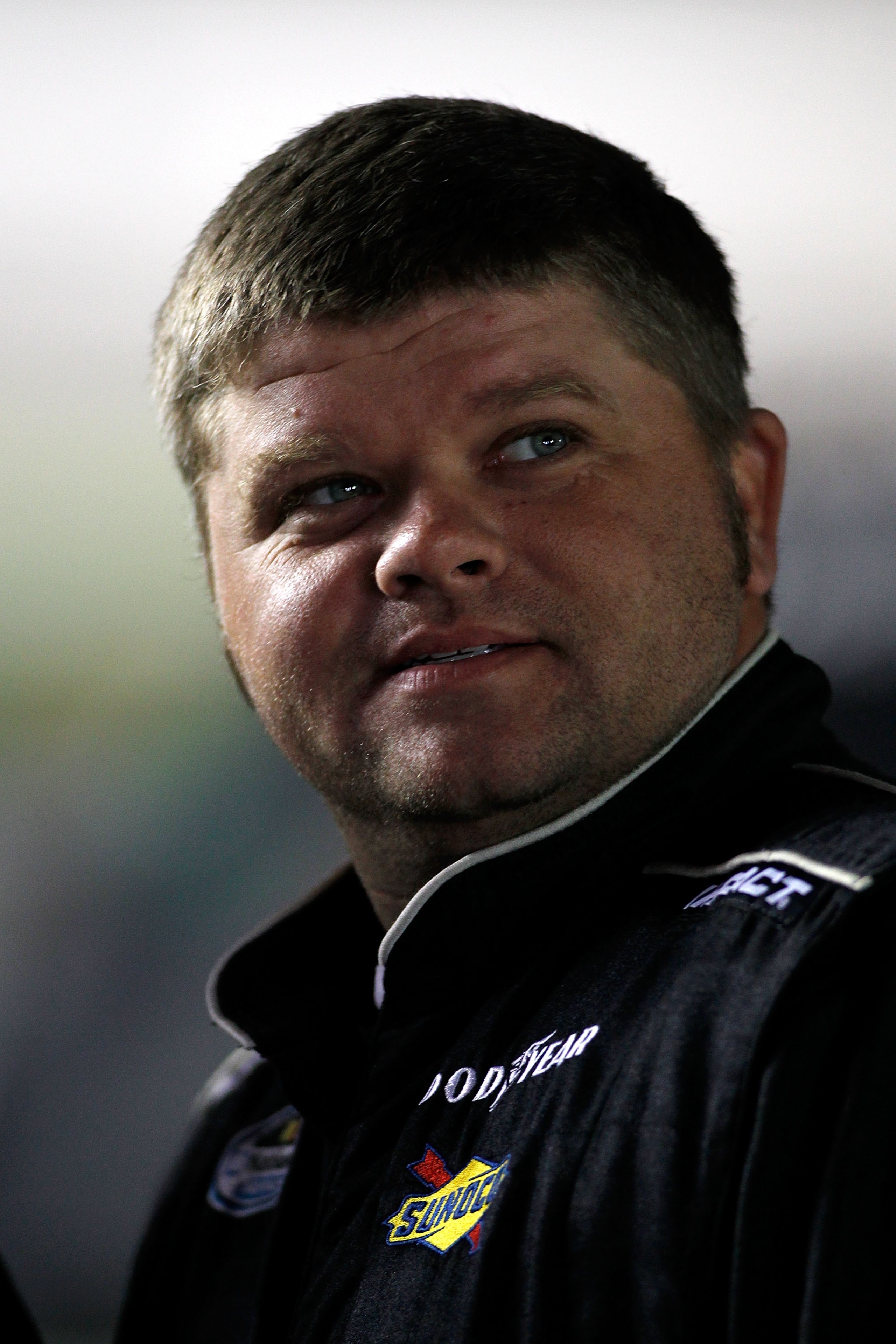 FORT WORTH, TX - NOVEMBER 04:  Bobby Hamilton Jr., driver of the #47 Lilly Trucking Chevrolet, stands on pit road during qualifying for the NASCAR Camping World Truck Series WinStar World Casino 350k at Texas Motor Speedway on November 4, 2010 in Fort Wor