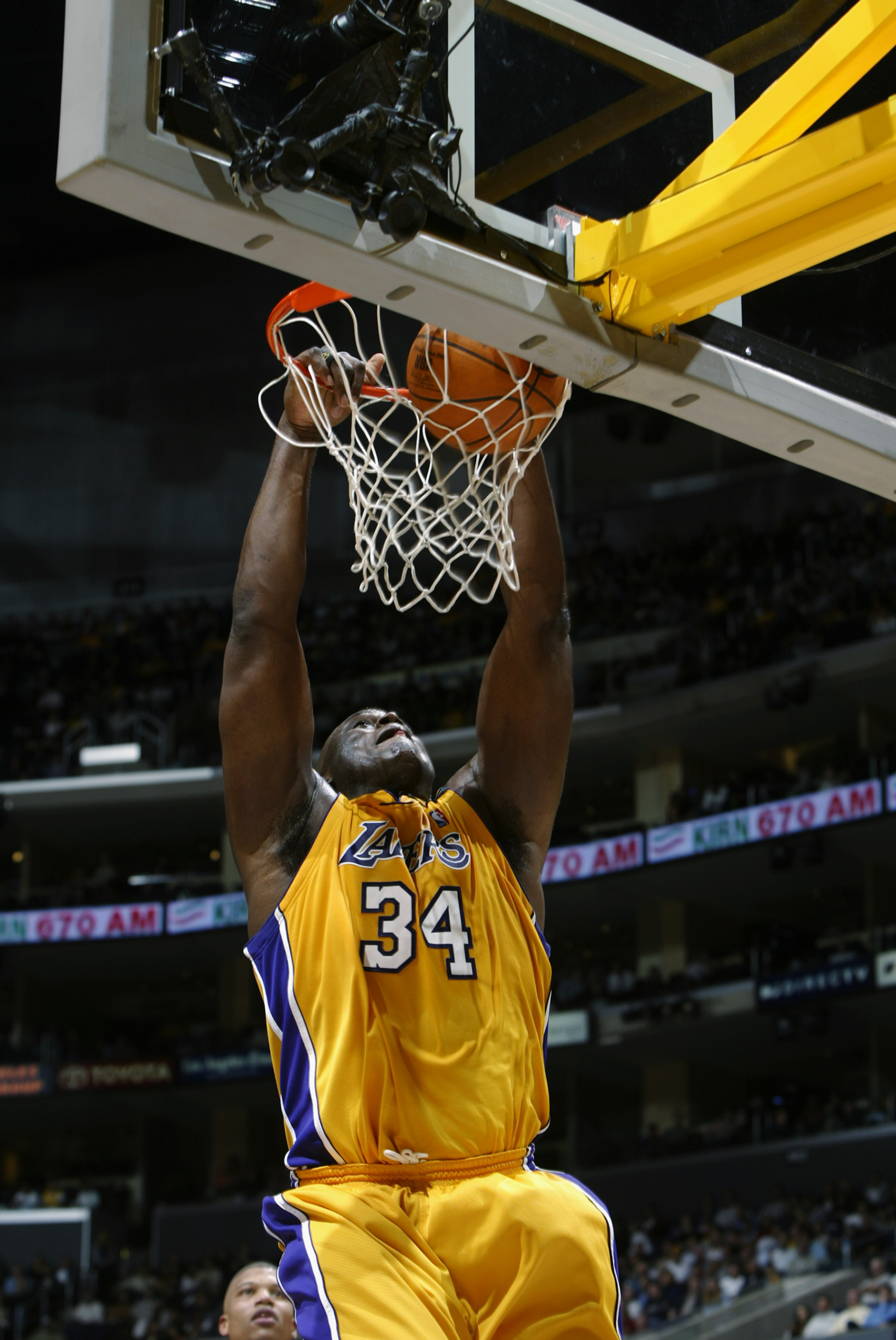LOS ANGELES - DECEMBER 3:  Shaquille O'Neal #34 of the Los Angeles Lakers slam dunks during the game against the Memphis Grizzlies at Staples Center on December 3, 2002 in Los Angeles, California.  The Lakers won 101-91.  NOTE TO USER: User expressly ackn