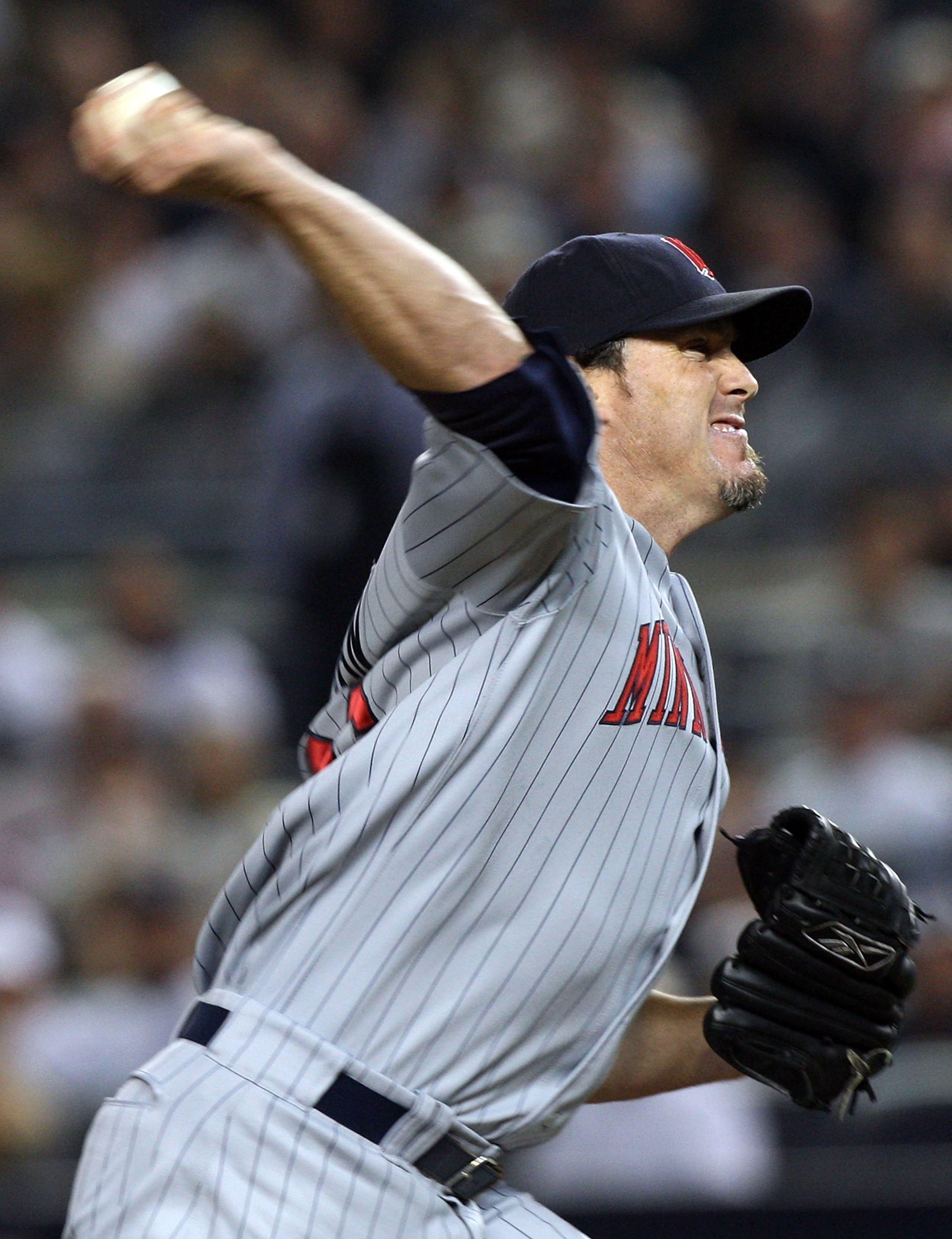 NEW YORK - OCTOBER 09:  Joe Nathan #36 of the Minnesota Twins pitches against the New York Yankees in Game Two of the ALDS during the 2009 MLB Playoffs at Yankee Stadium on October 9, 2009 in the Bronx borough of New York City.  (Photo by Jim McIsaac/Gett