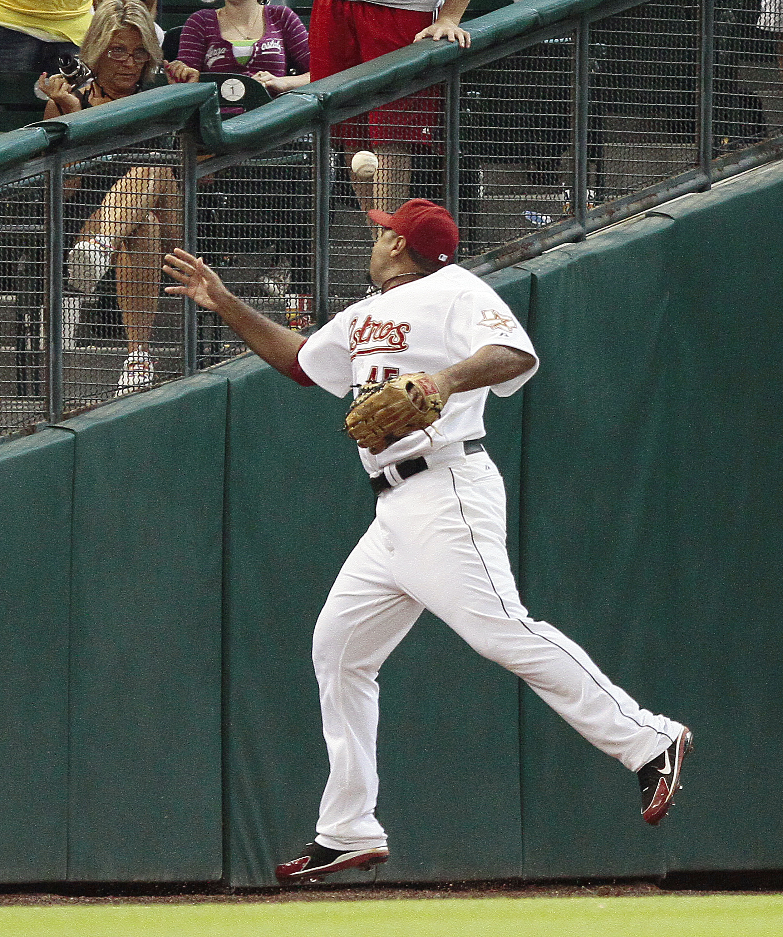 Houston Astros left fielder Carlos Lee (45) up to bat in the